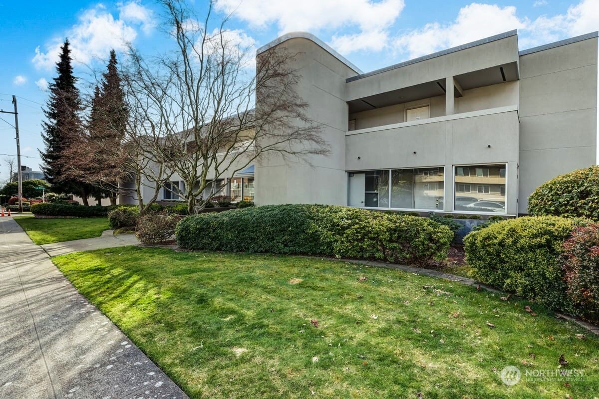 Property Photo: 4457 44th Avenue SW 104 WA 98116