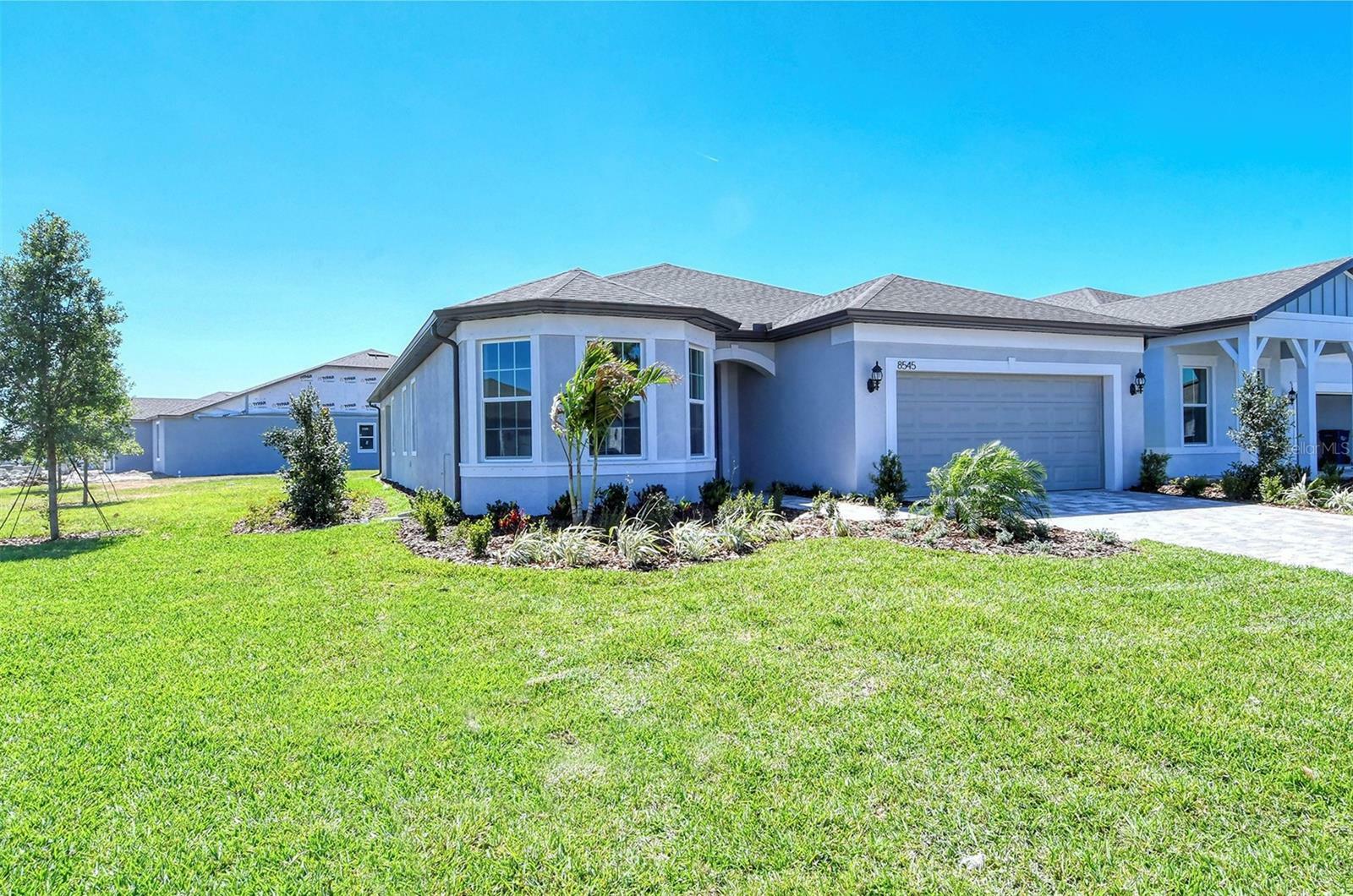 Property Photo:  8545 Coastal Palms Glen  FL 34219 