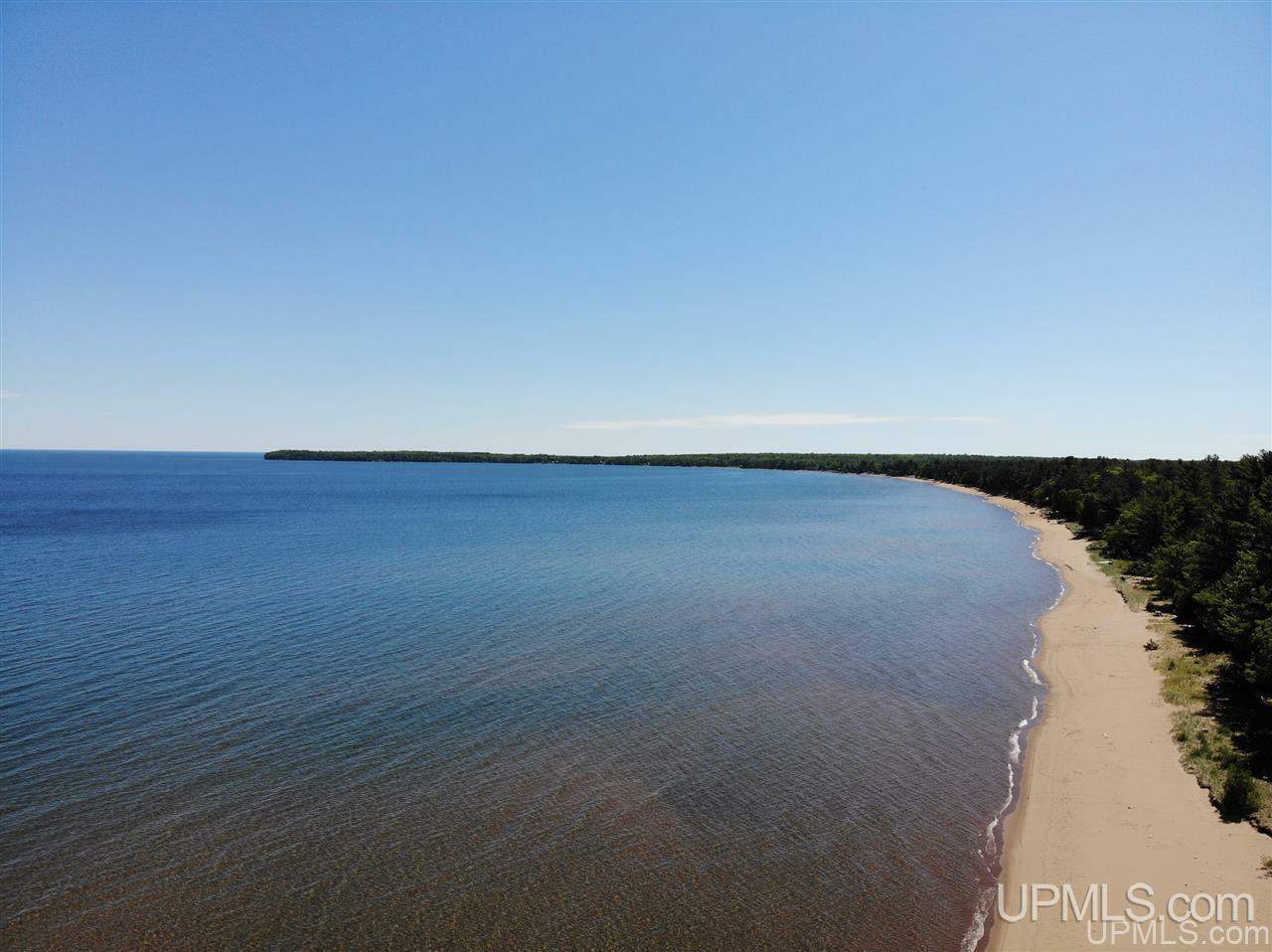 Property Photo:  Tbd Squaw Beach Rd  MI 49808 