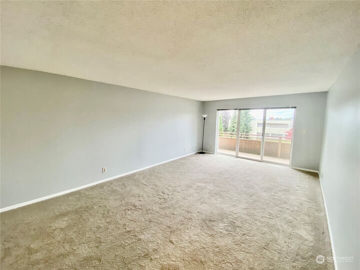 Property Photo:  4444 44th Avenue SW 201  WA 98116 