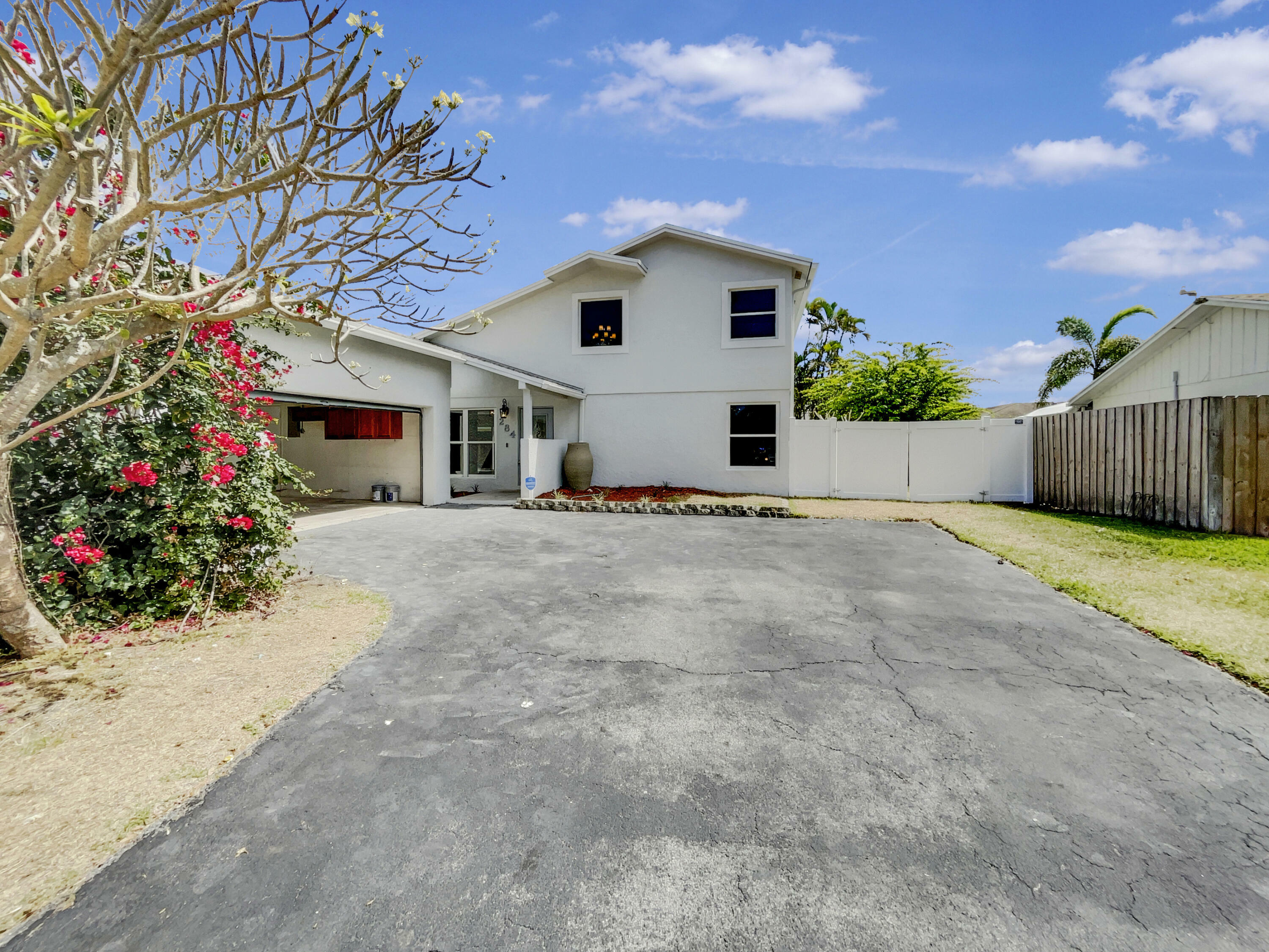 Property Photo:  284 NW 40th Terrace  FL 33442 