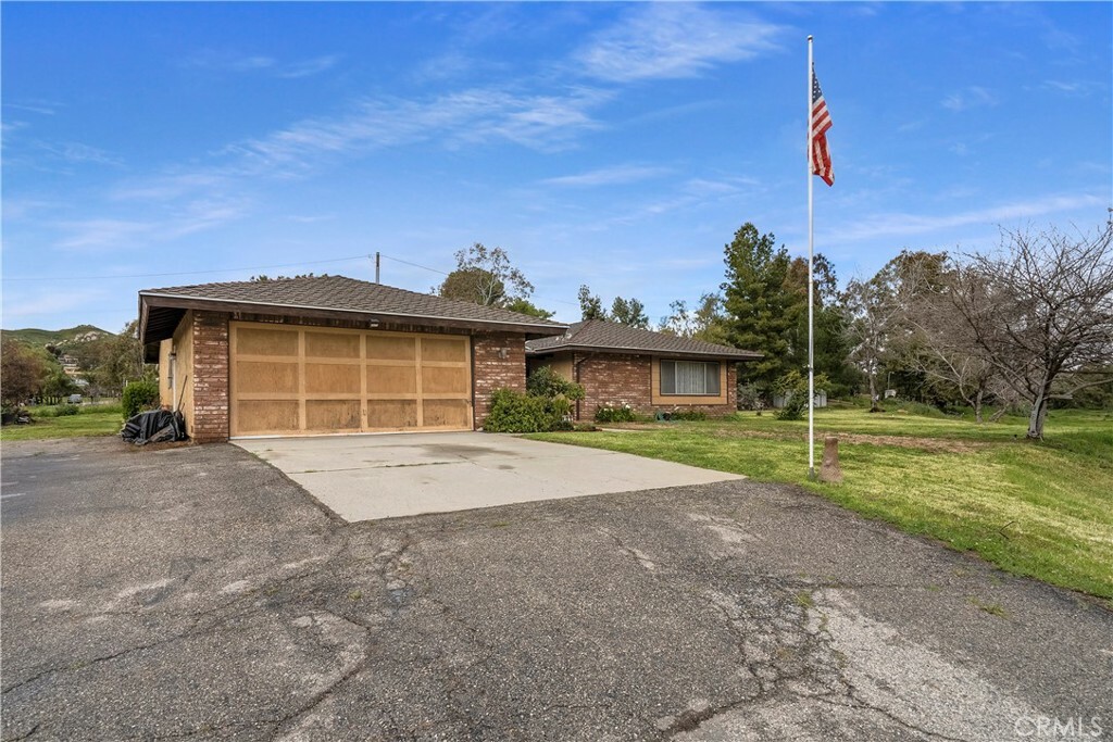 Property Photo:  9095 Peoria Lane  CA 92557 