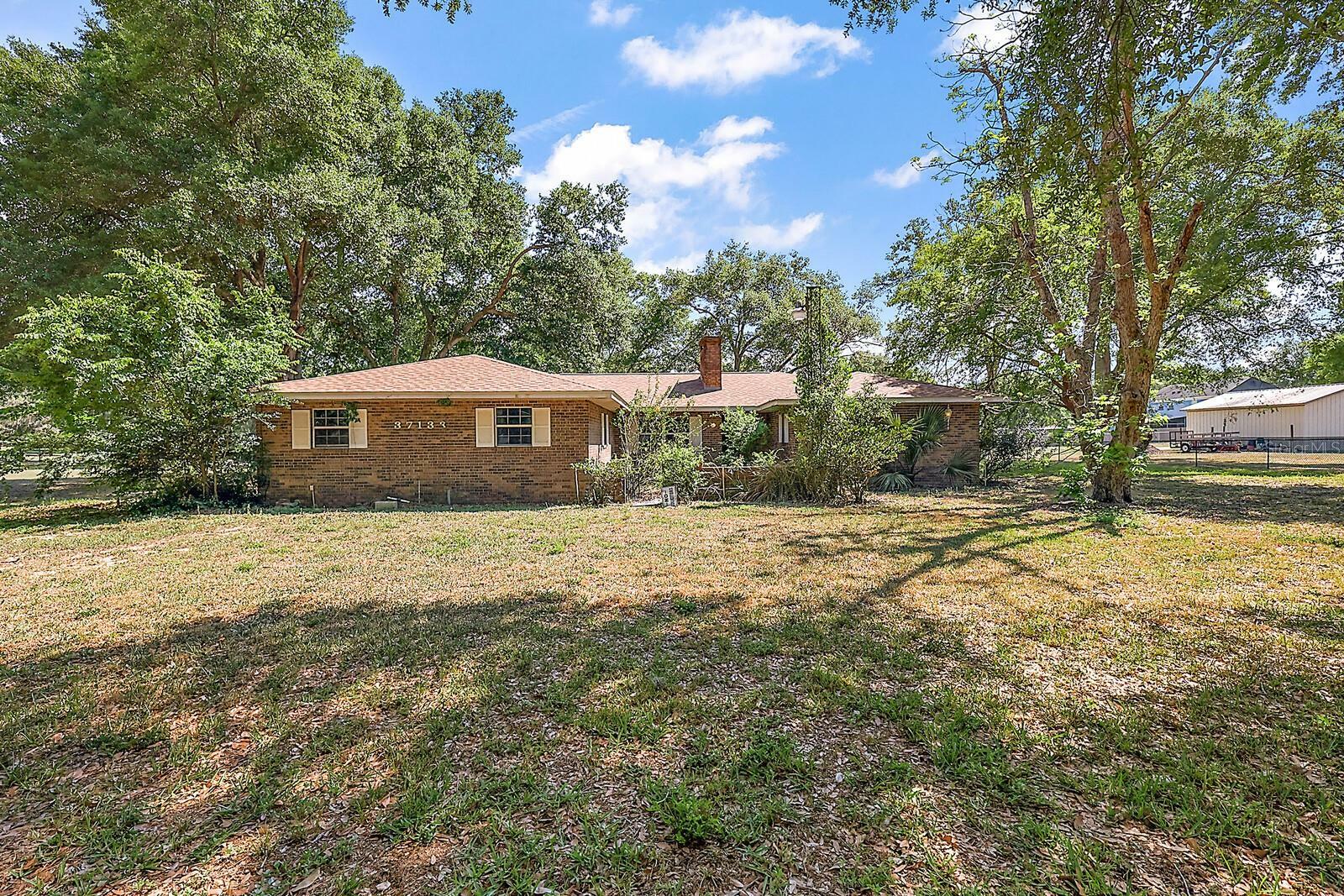 Property Photo:  37133 County Road 452  FL 32735 