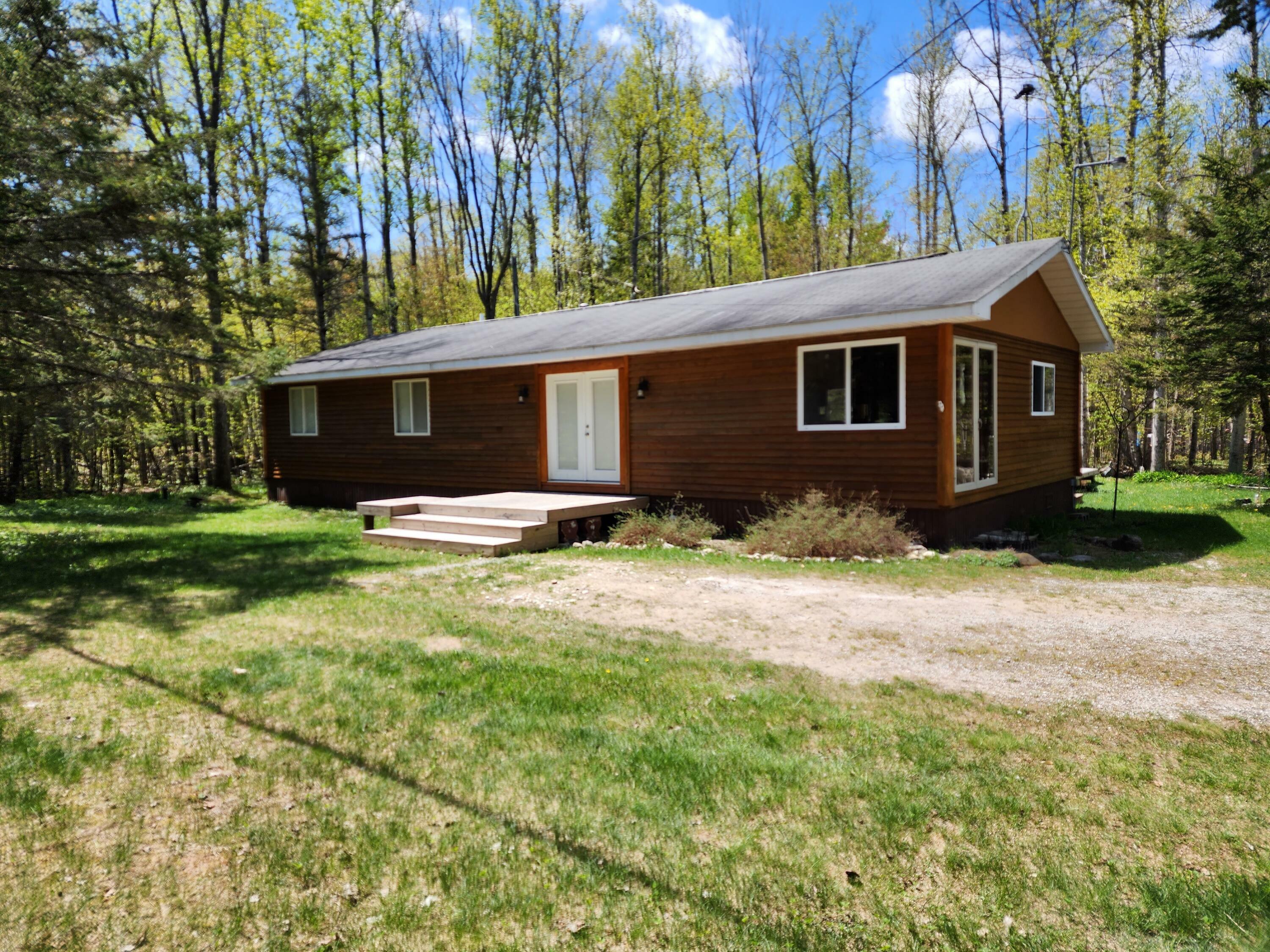 Property Photo:  3611 N 3 Mile Rd  MI 49745 