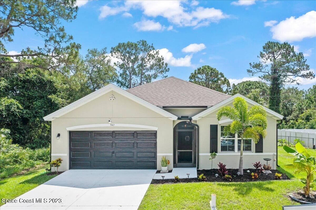 Property Photo: 941 Century Avenue SE FL 32909