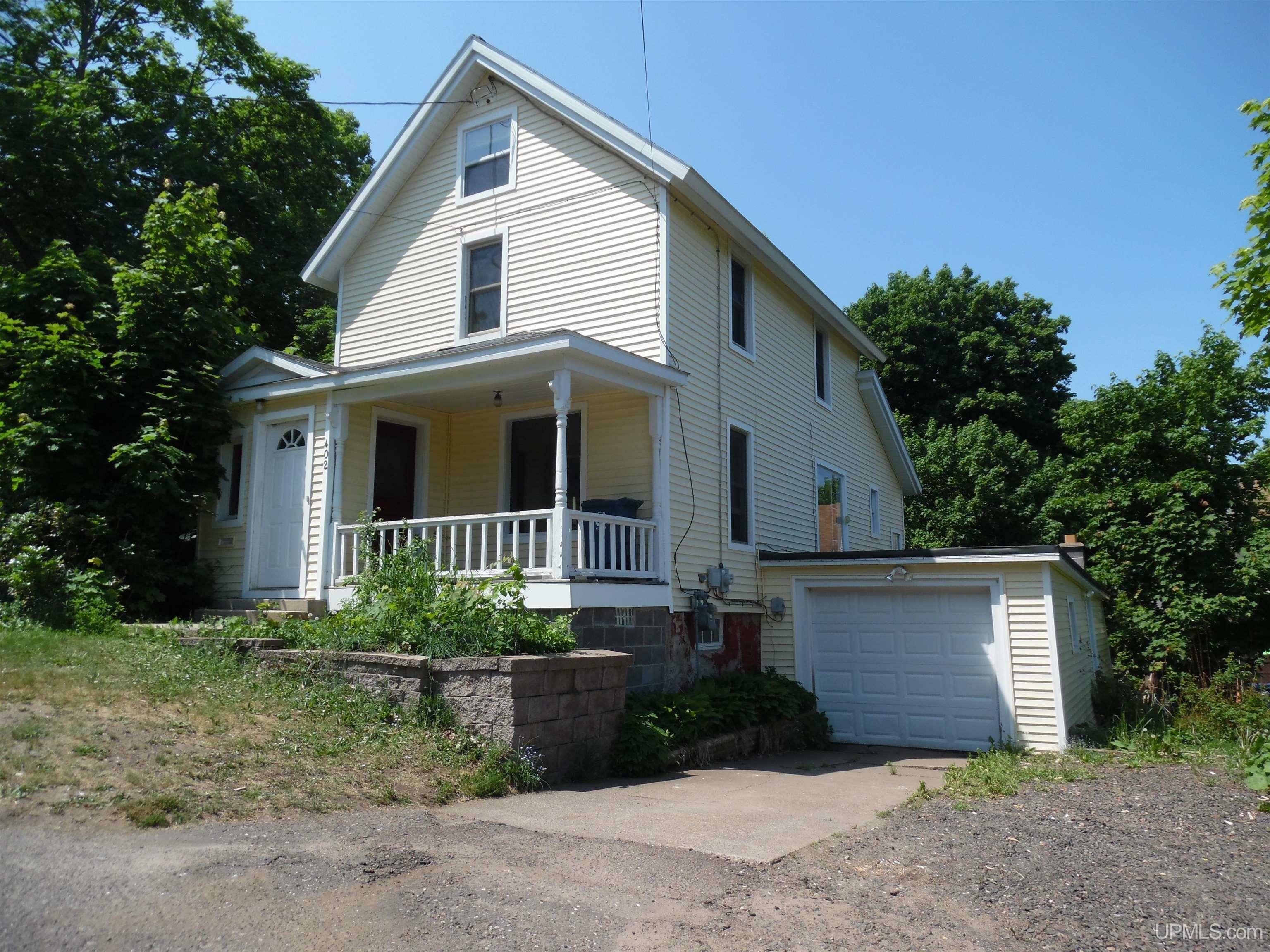 Property Photo:  402 Sixth St  MI 49931 