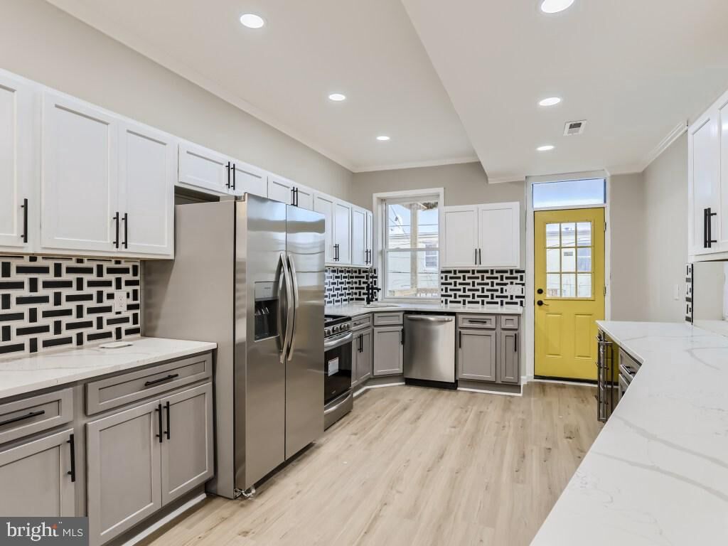 Property Photo:  2409 Edmondson Avenue  MD 21223 