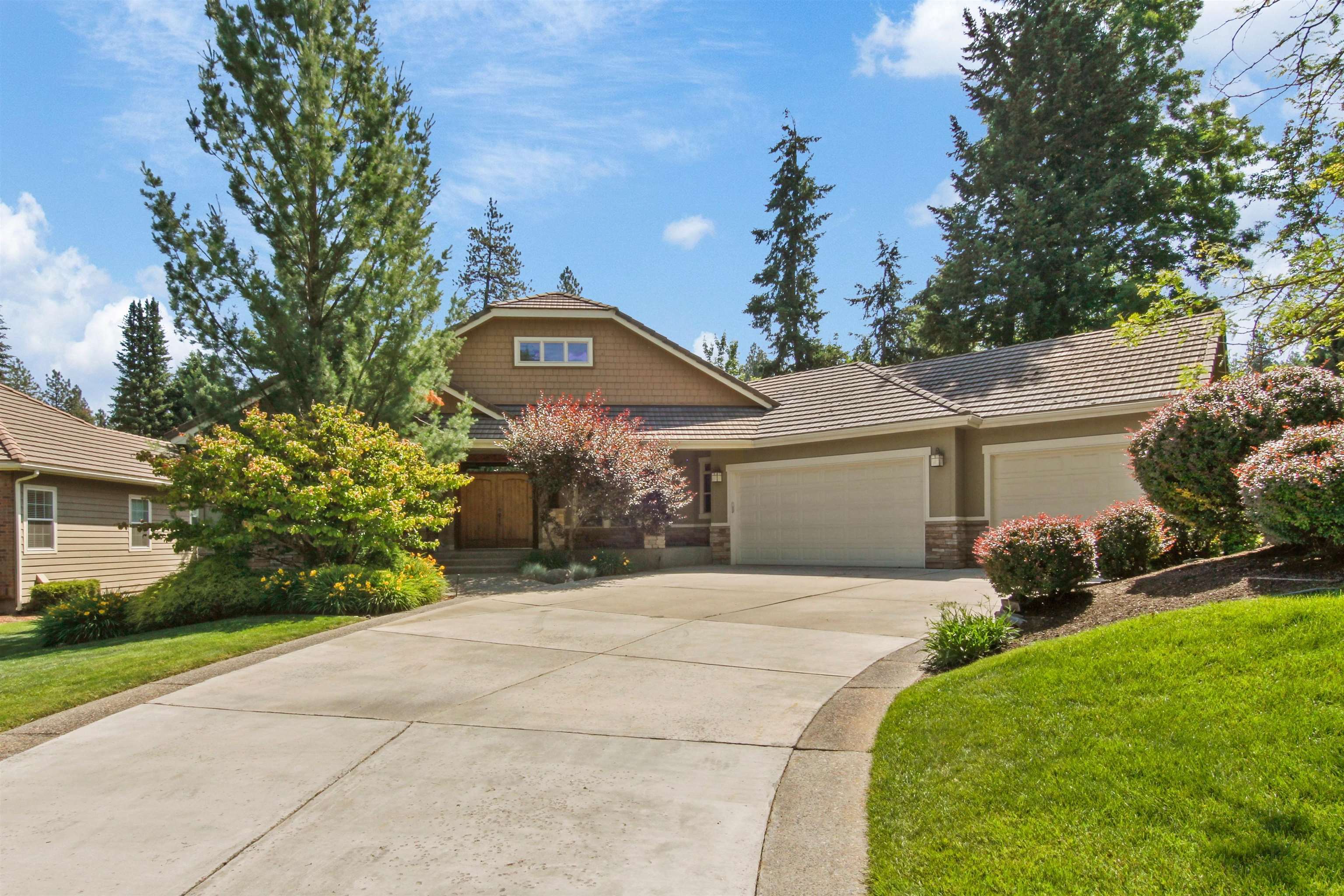 Property Photo:  12002 N River Wood Dr  WA 99218 