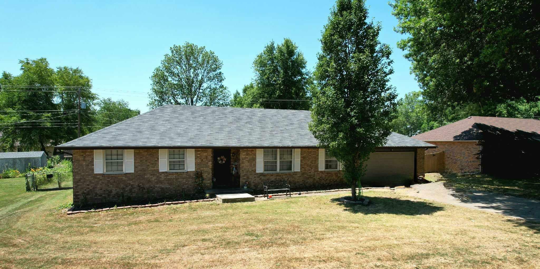 Property Photo:  1350 E Walnut Lawn Street  MO 65804 