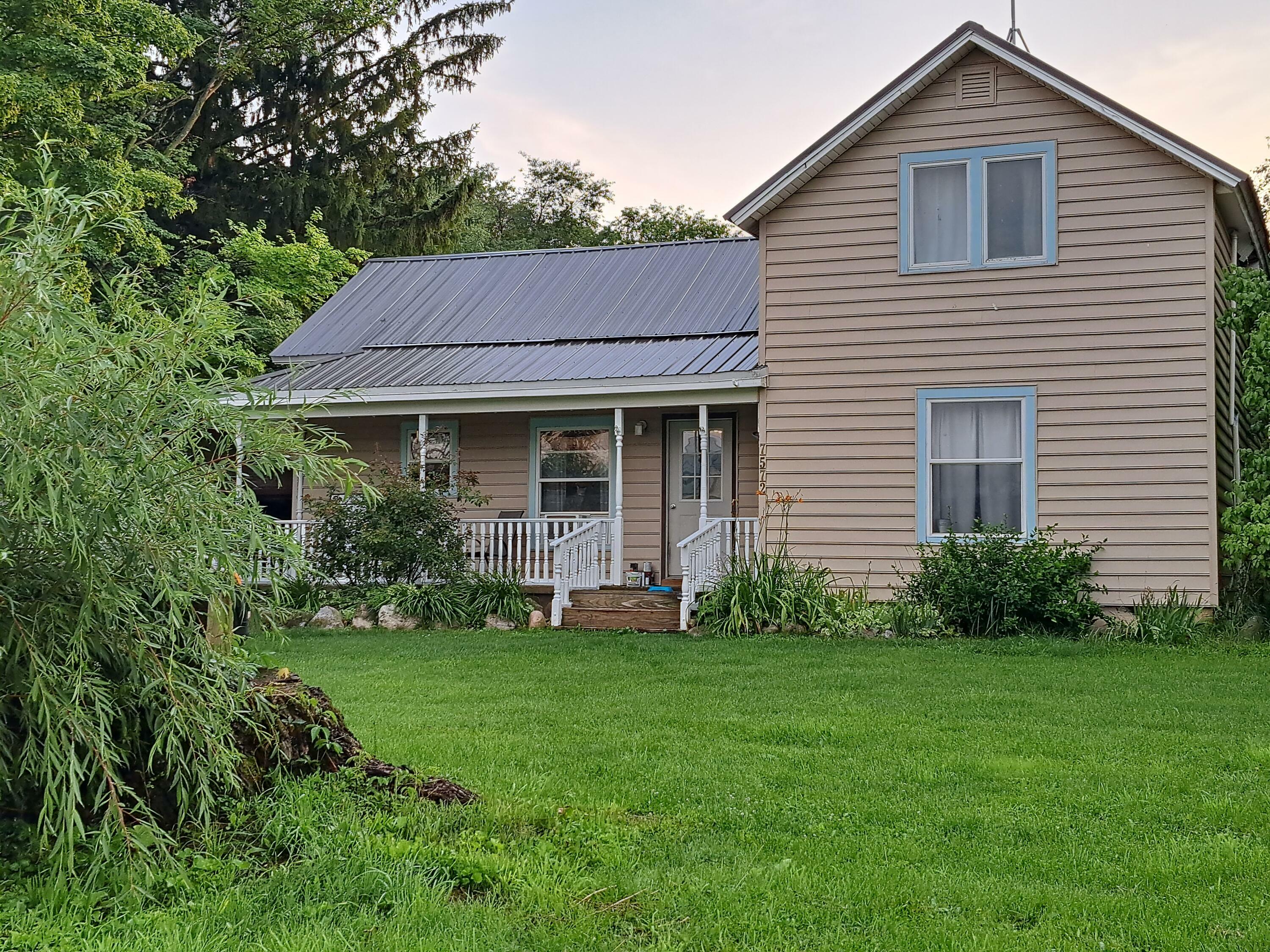 Property Photo:  7572 Collins Road  MI 48834 