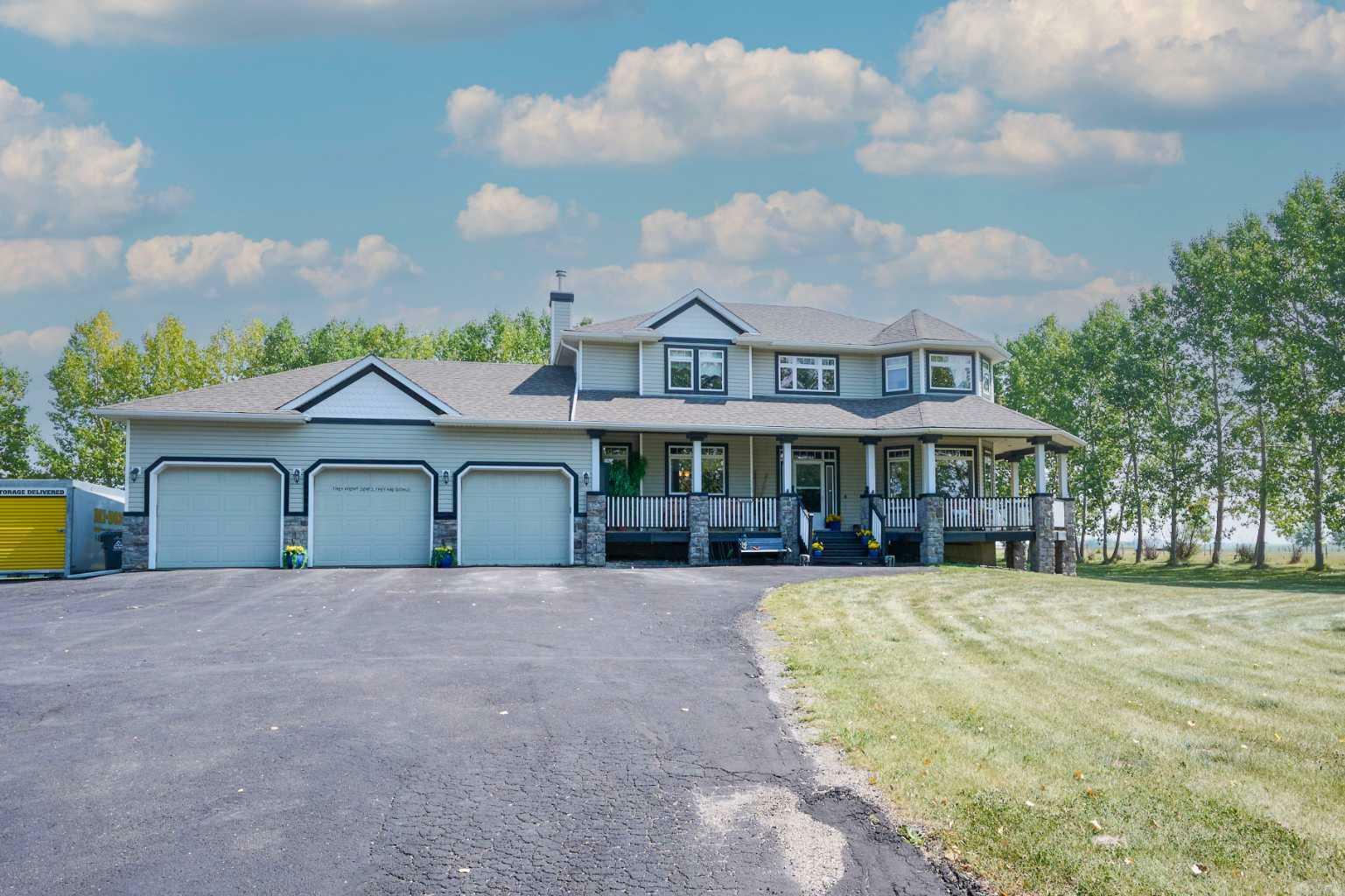 Property Photo: 263140 Butte Hills Way AB T4A 0P6