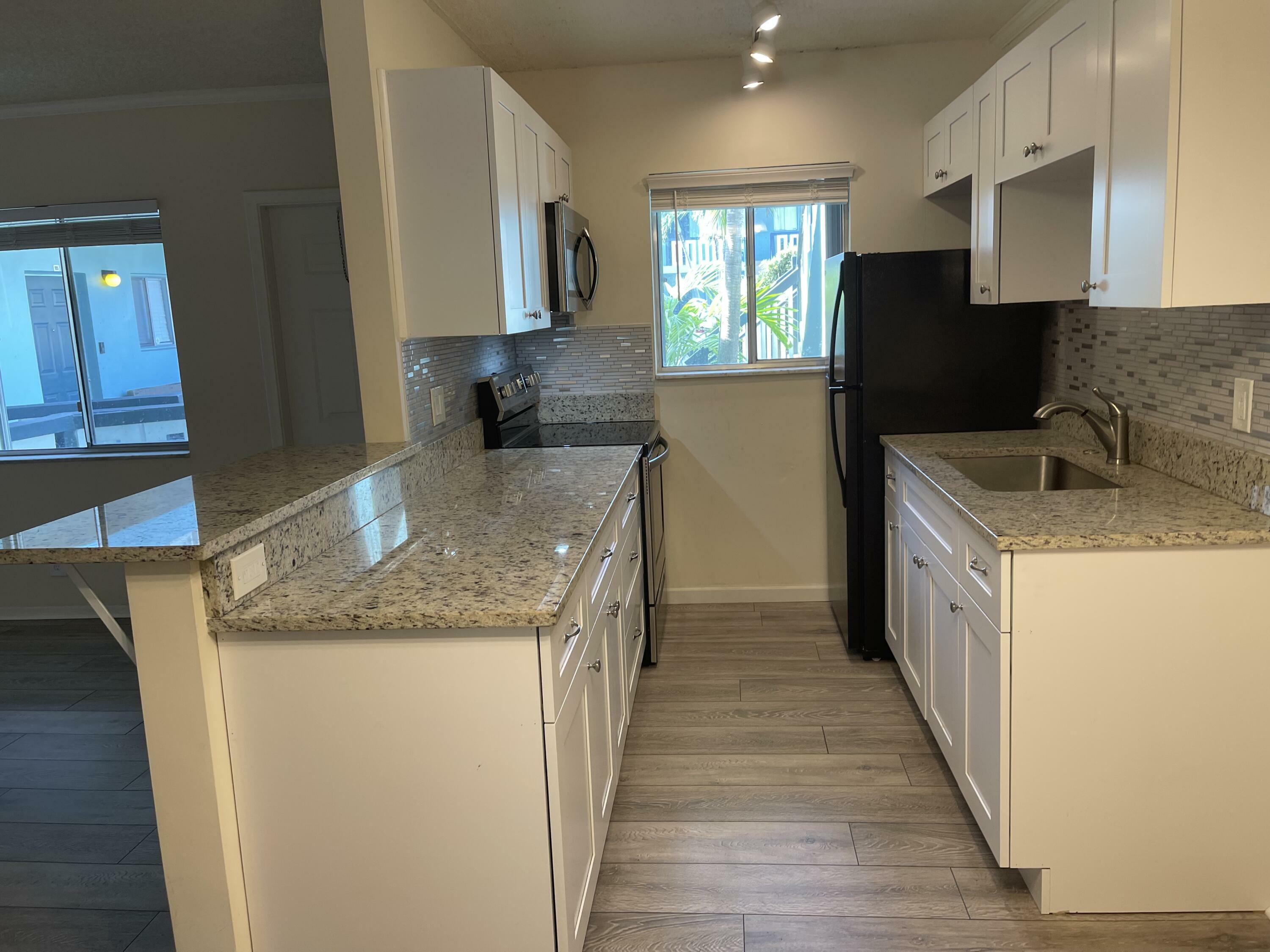 Property Photo:  306 E Ocean Avenue 102  FL 33435 