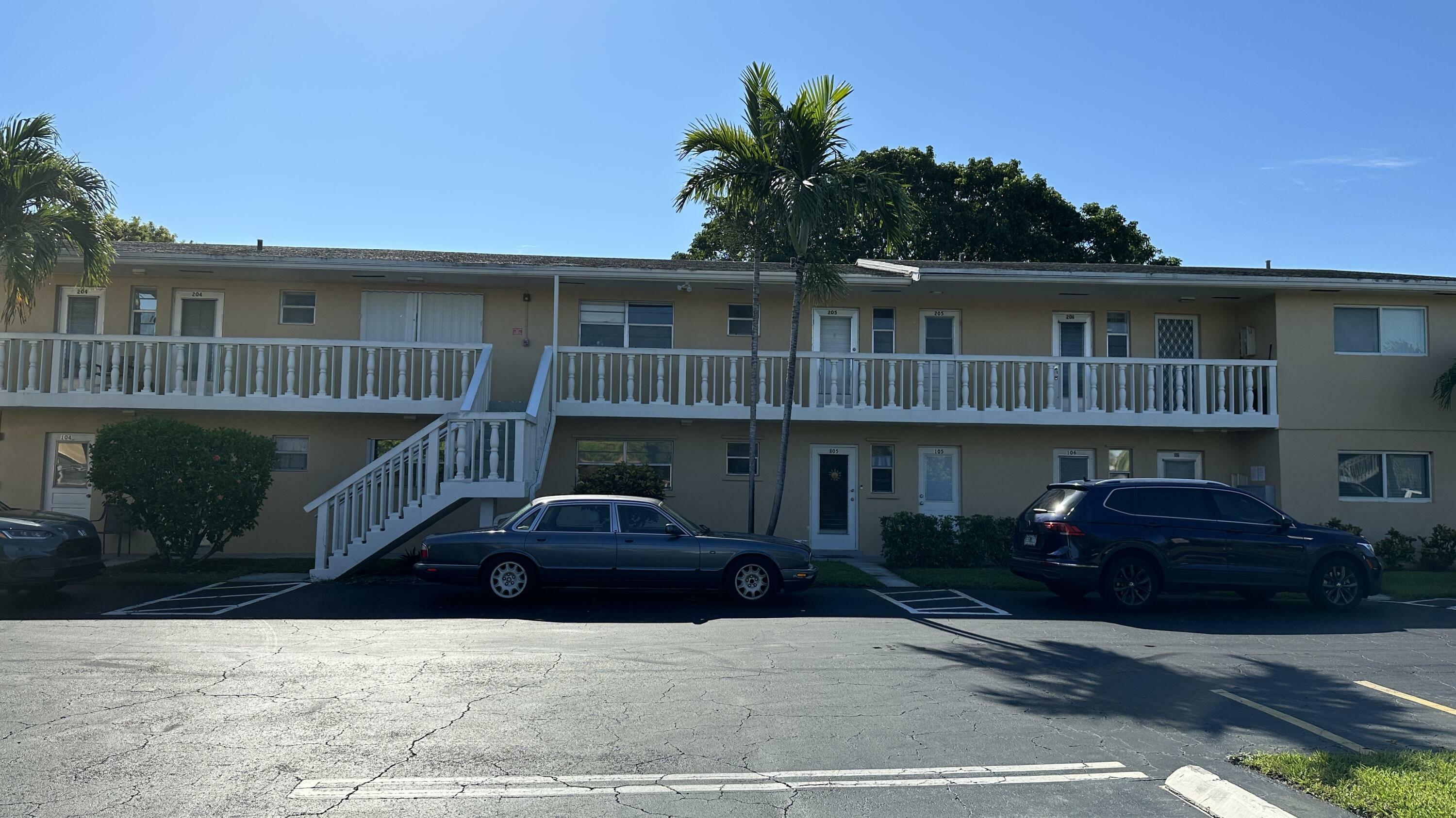 Property Photo:  2214 NE 1st Way 206  FL 33435 