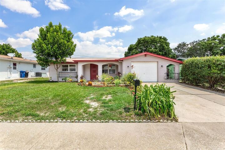 Property Photo: 9902 Richwood Lane FL 34668