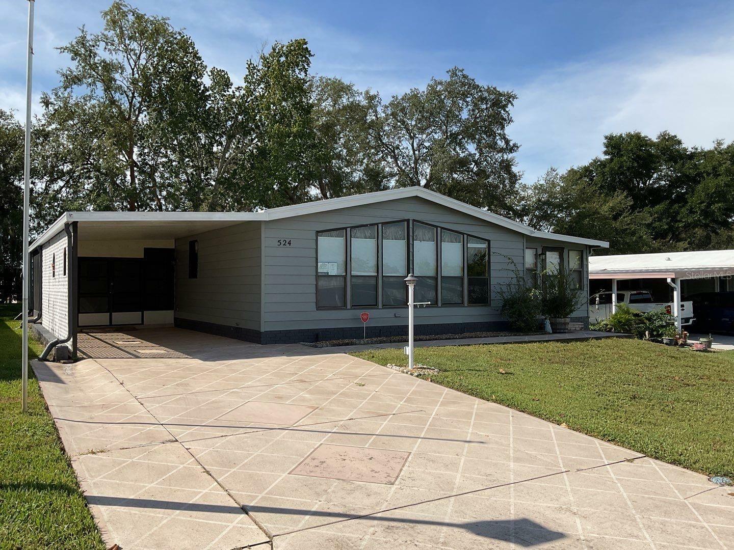 Property Photo: 524 Rainbow Boulevard FL 32159