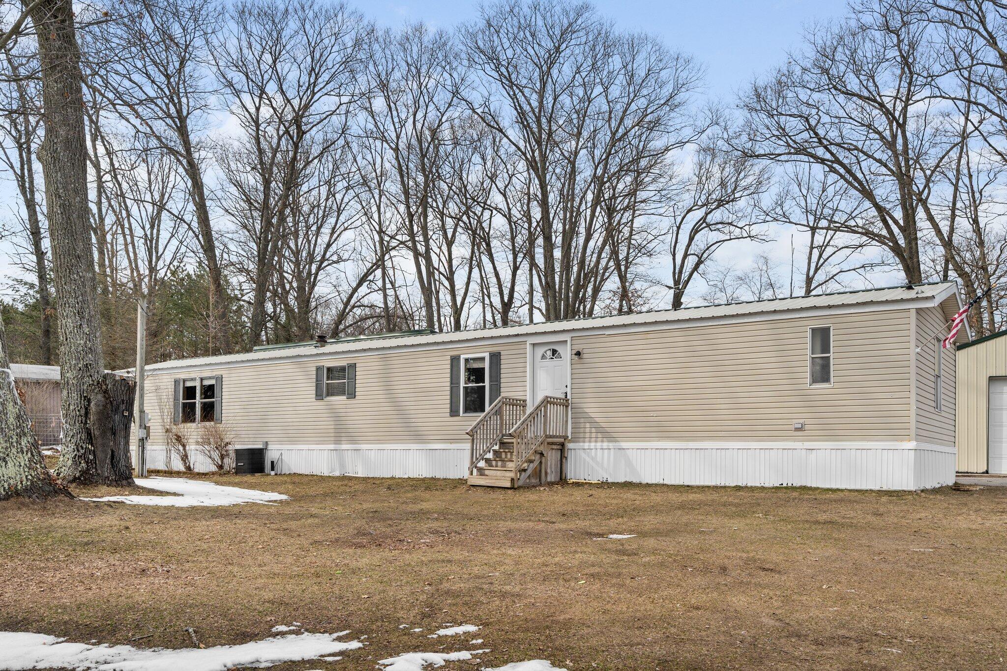 Property Photo:  7136 E US Highway 10  MI 49623 
