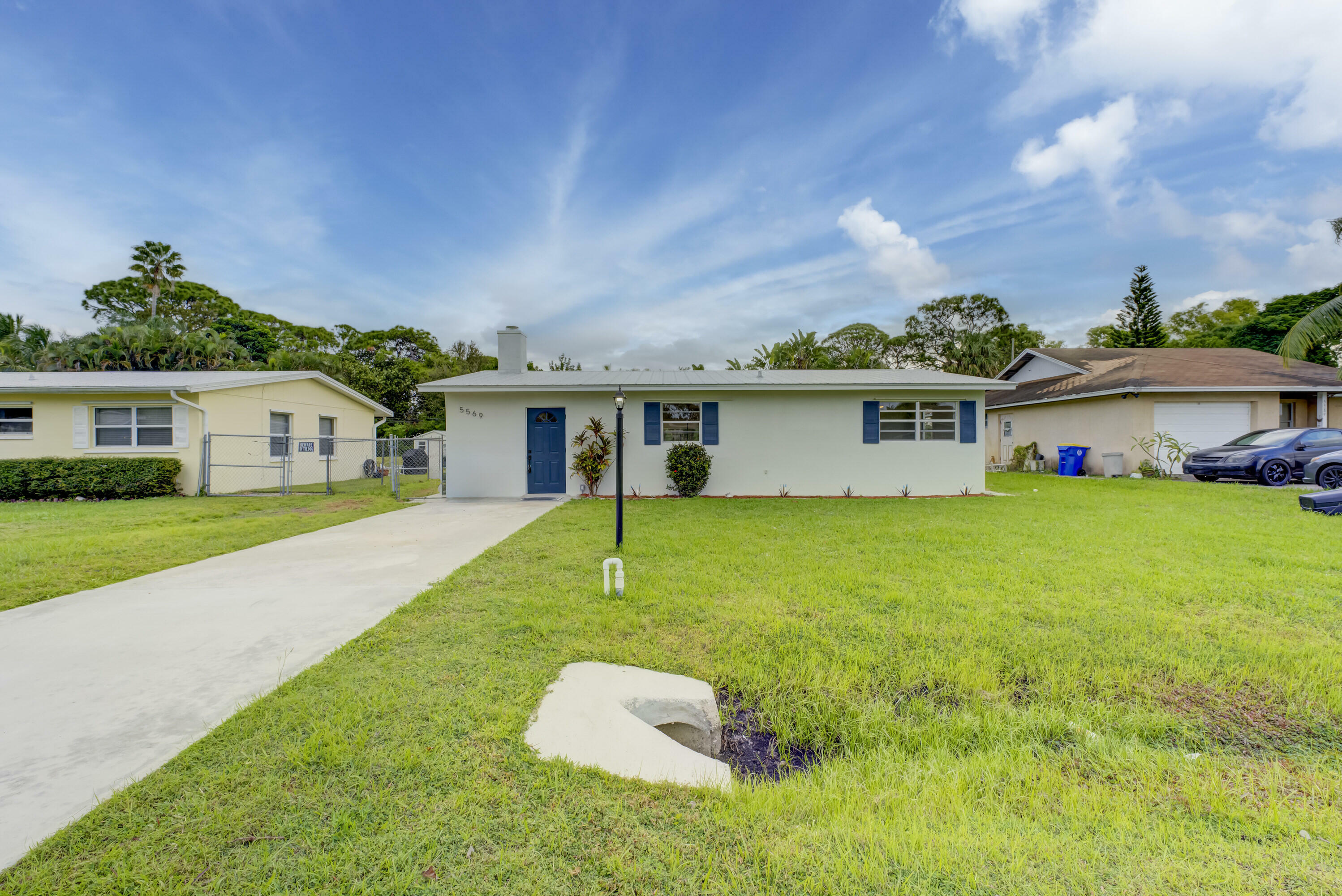 Property Photo:  5569 SE Normandy Avenue  FL 34997 