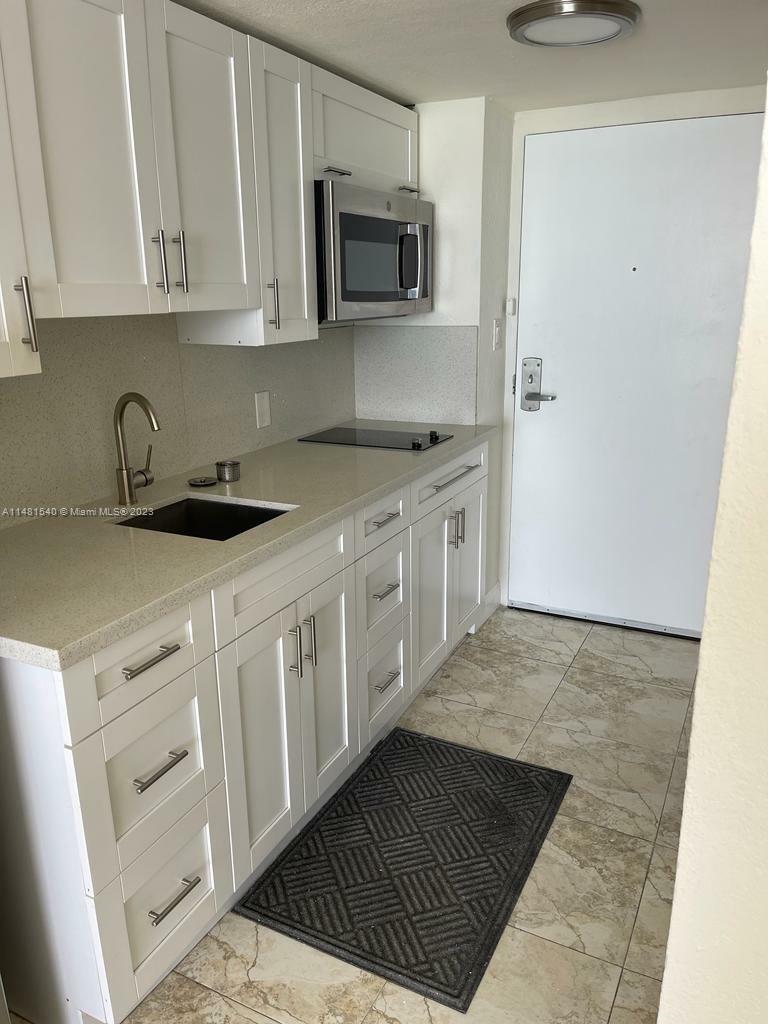 Property Photo:  19201 Collins Ave 411  FL 33160 