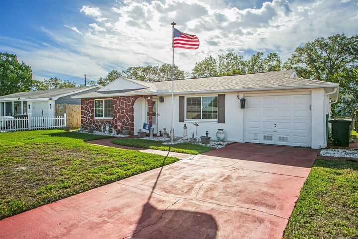 Property Photo:  6304 Westport Drive  FL 34668 