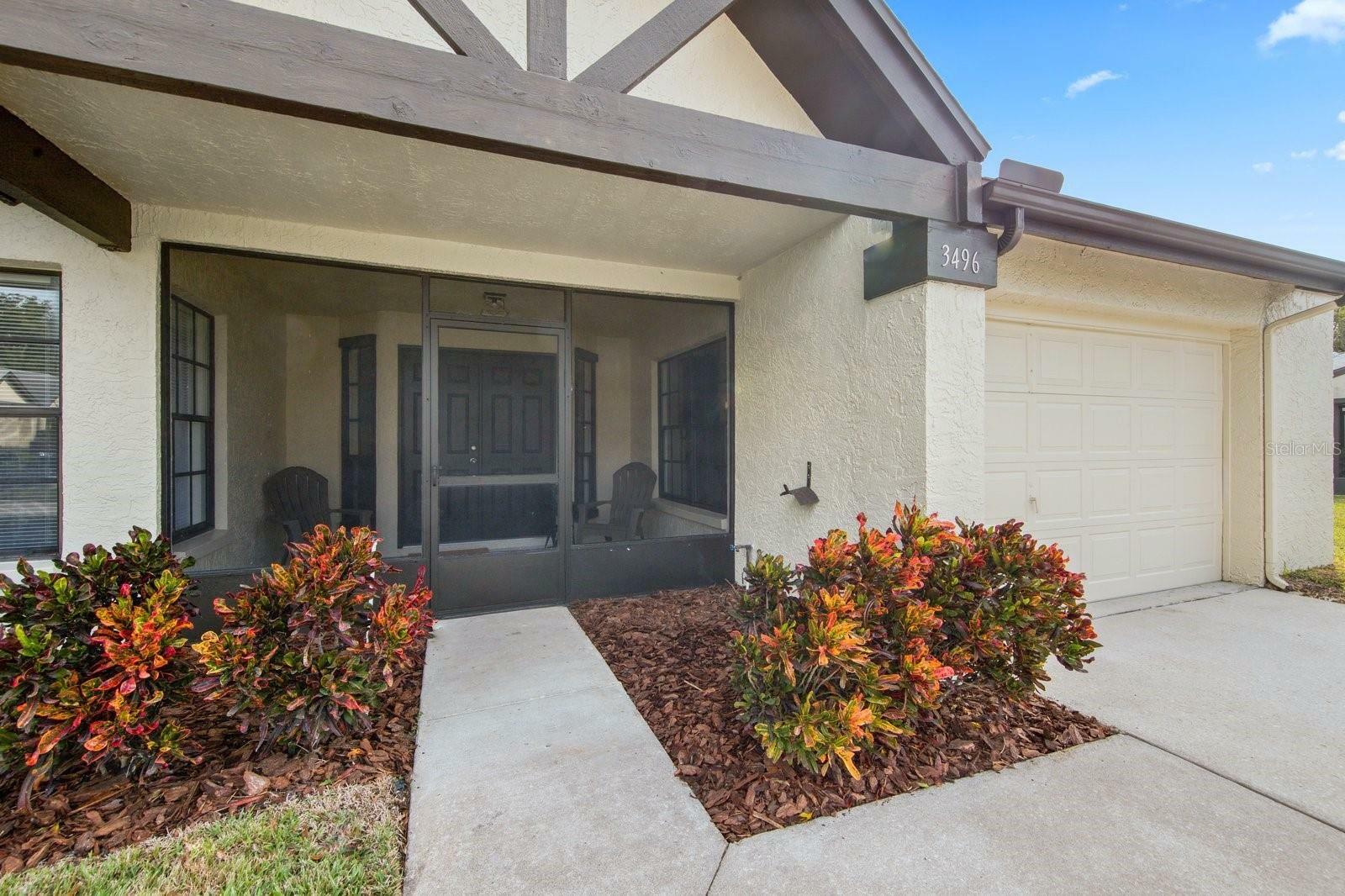 Property Photo: 3496 E Woodmont Way FL 34684