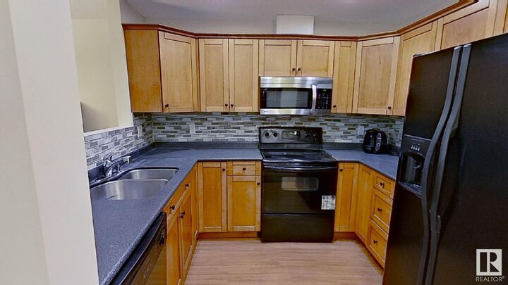 Property Photo:  12110 106 Avenue NW 119  AB T5N 4R9 