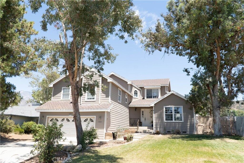 Property Photo:  11821 Sutter Avenue  CA 92399 