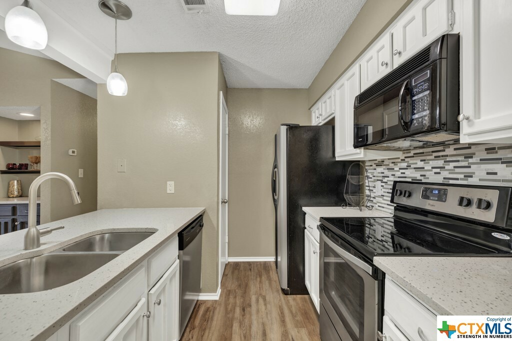 Property Photo:  1202 Thorpe Lane 302  TX 78666 