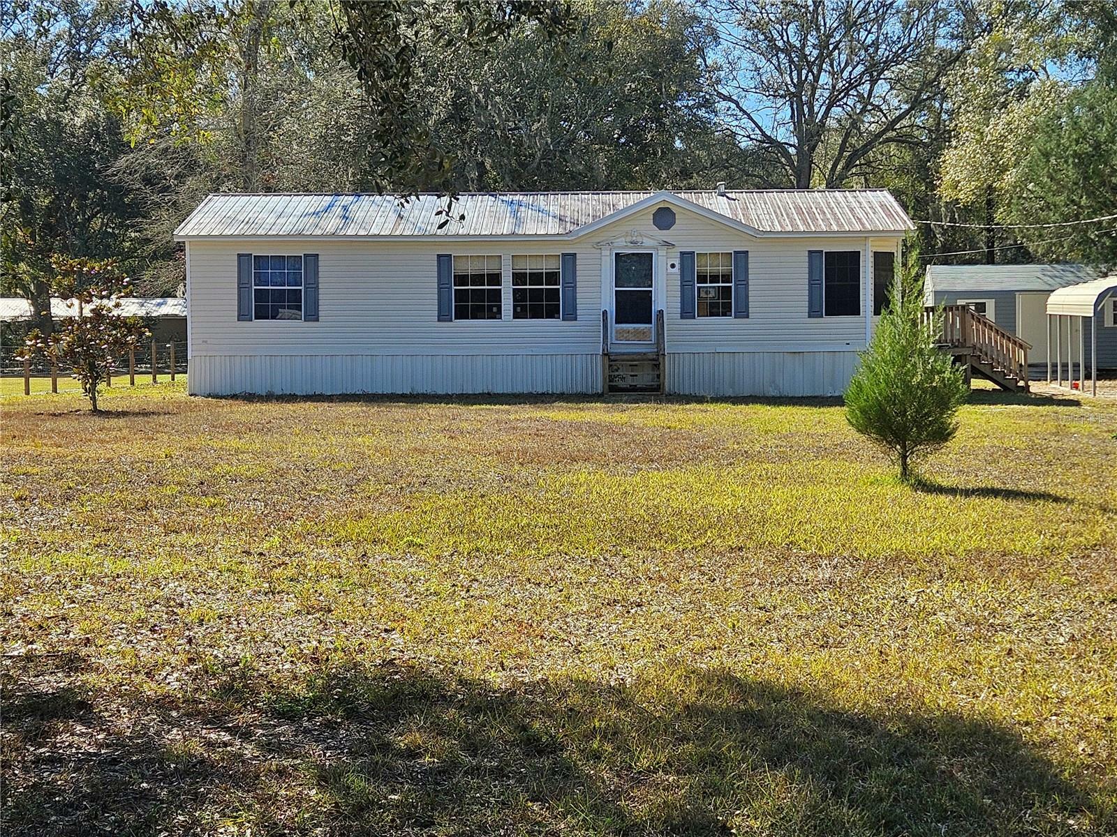 Property Photo:  7080 NW 166th Street  FL 32693 