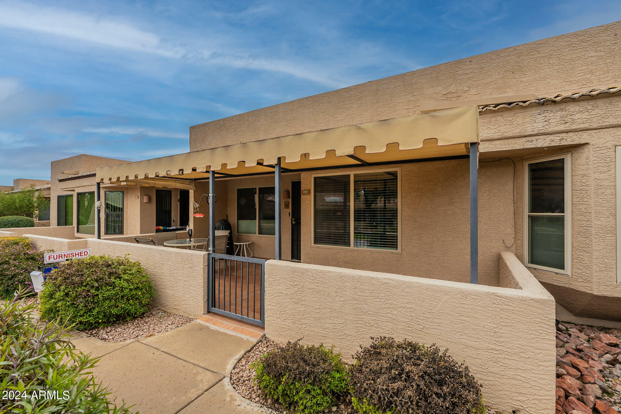 Property Photo:  14300 W Bell Road 227  AZ 85374 