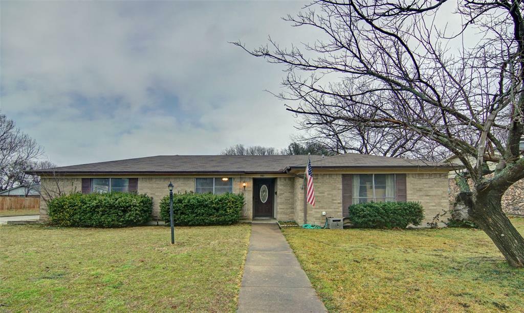 Property Photo:  301 SE Gardens Boulevard  TX 76028 