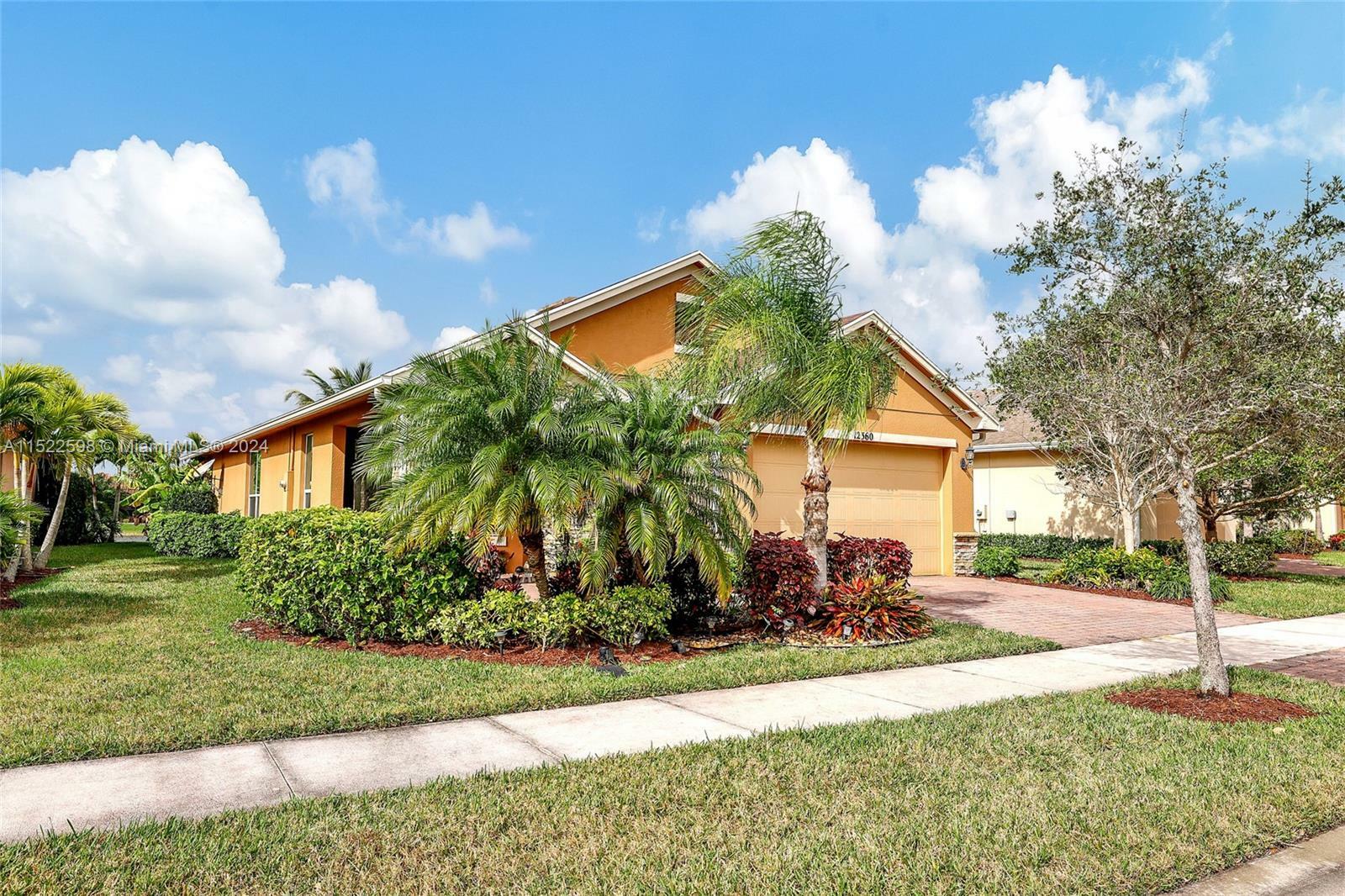 Property Photo:  12360 SW Weeping Willow Ave  FL 34987 