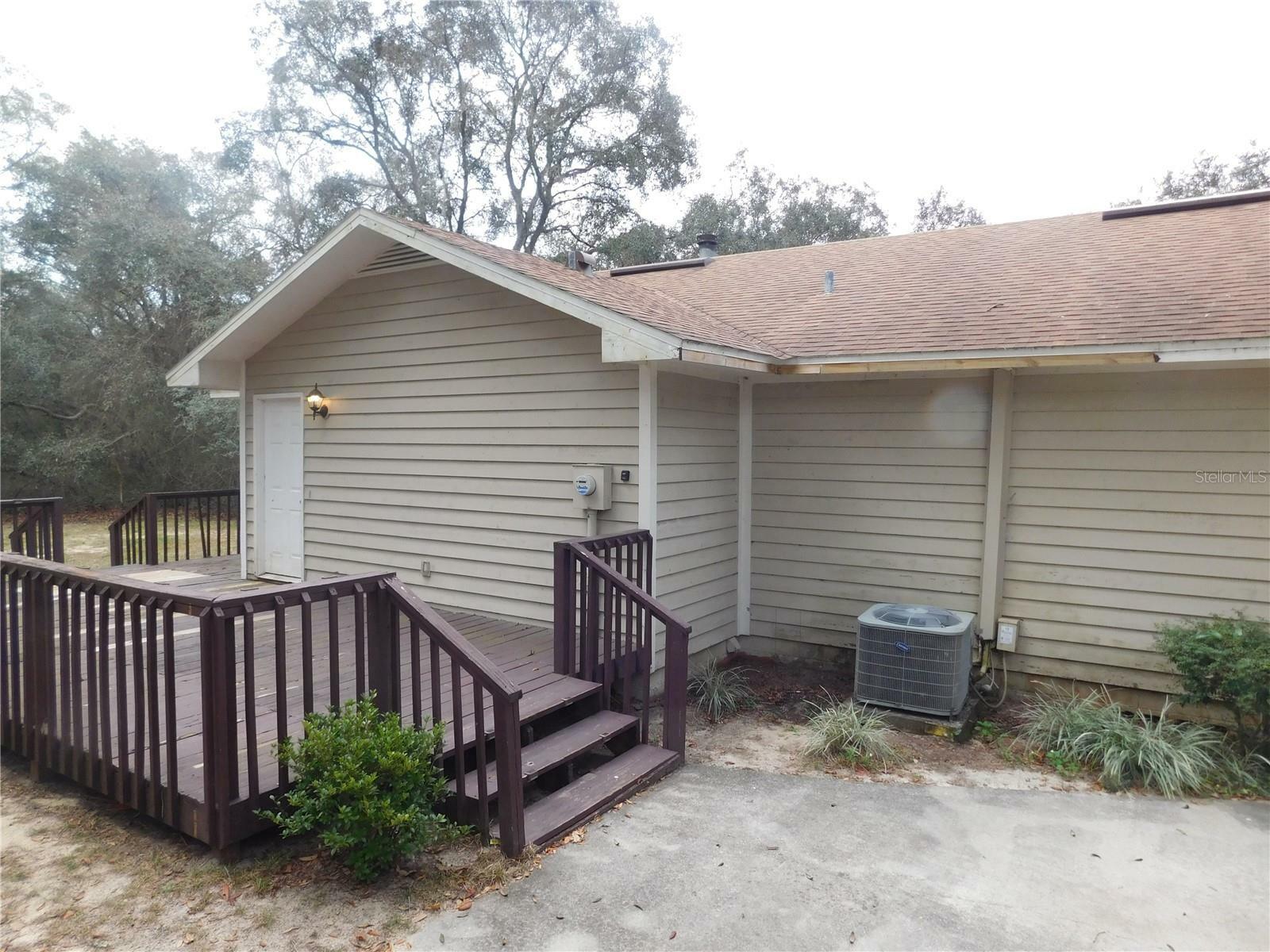 Property Photo:  8229 State Road 100  FL 32656 