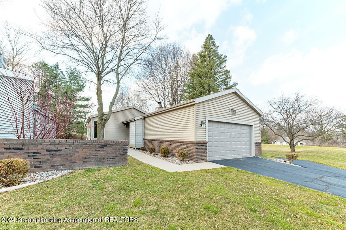 Property Photo:  3735 Cavalier Drive  MI 48864 