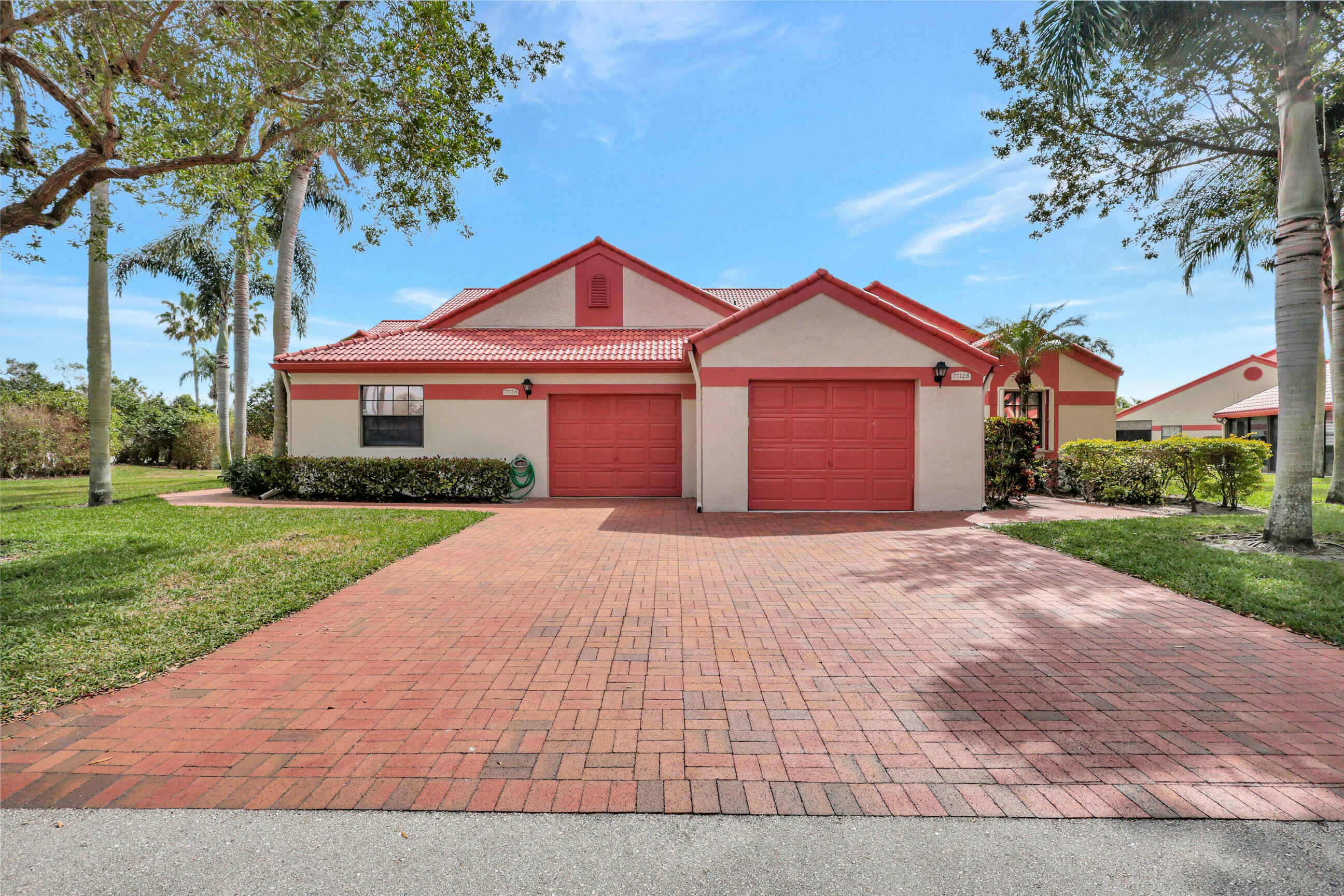 Property Photo:  7712 Lexington Club Boulevard A  FL 33446 