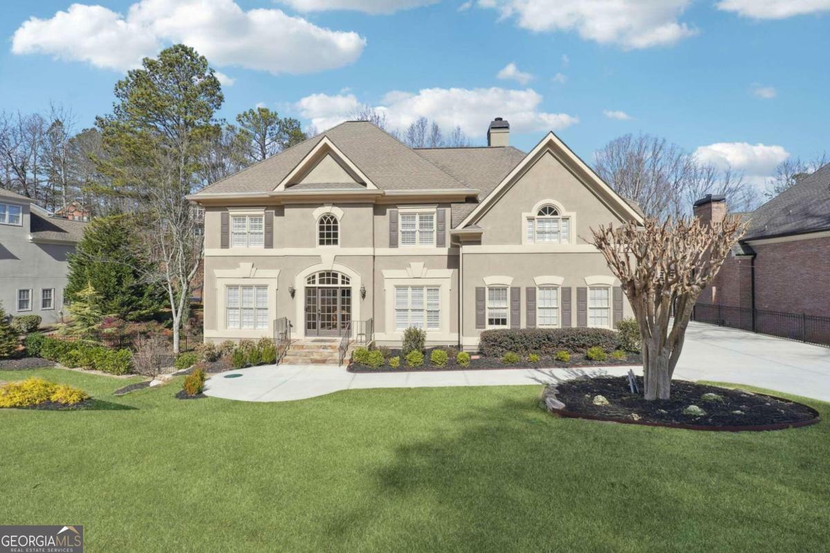 Property Photo:  9350 Nesbit Lakes Drive  GA 30022 