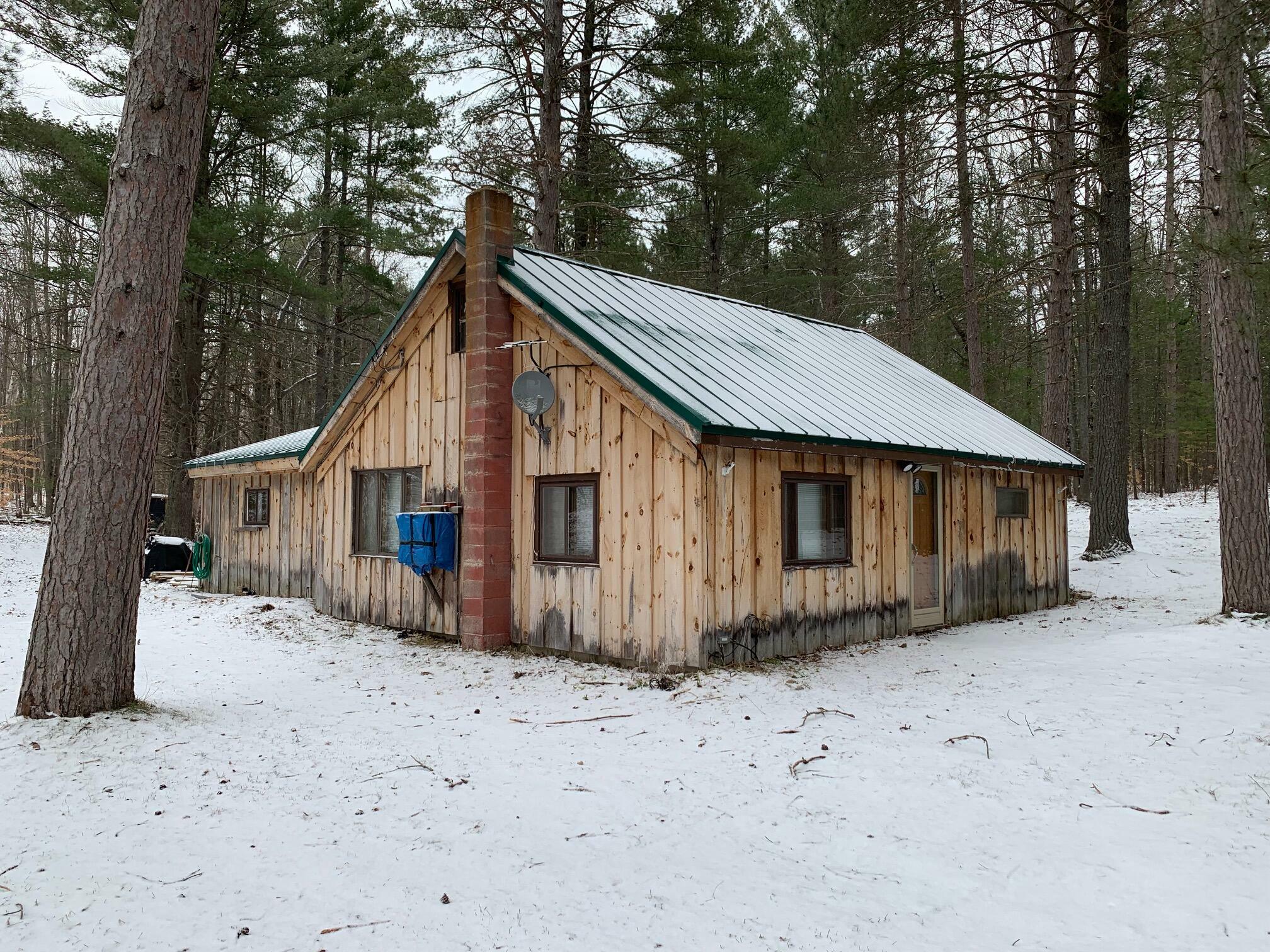 Property Photo:  7932 E Sturgeon Valley Road  MI 49795 