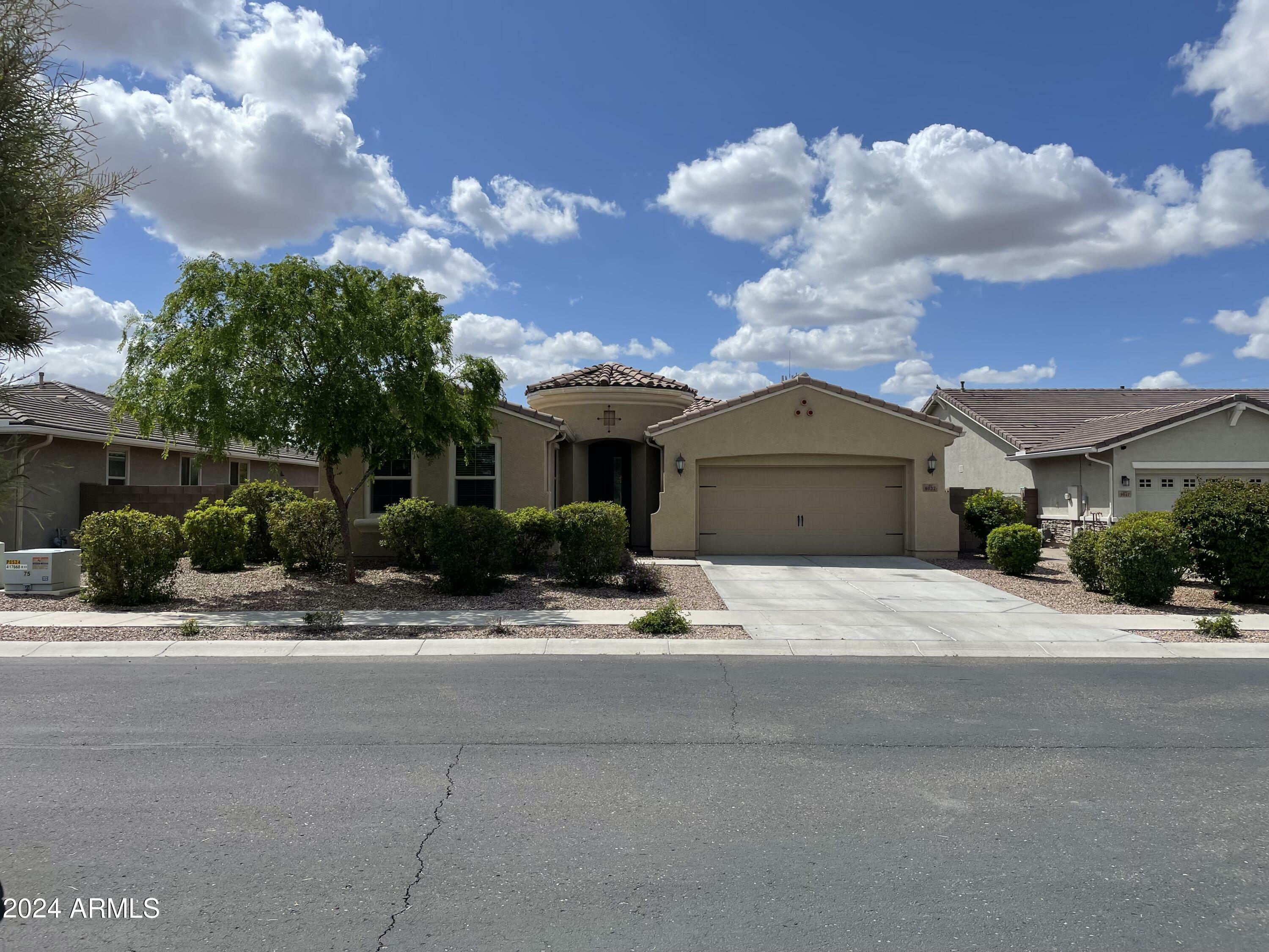 Property Photo:  9037 W Orchid Lane  AZ 85345 