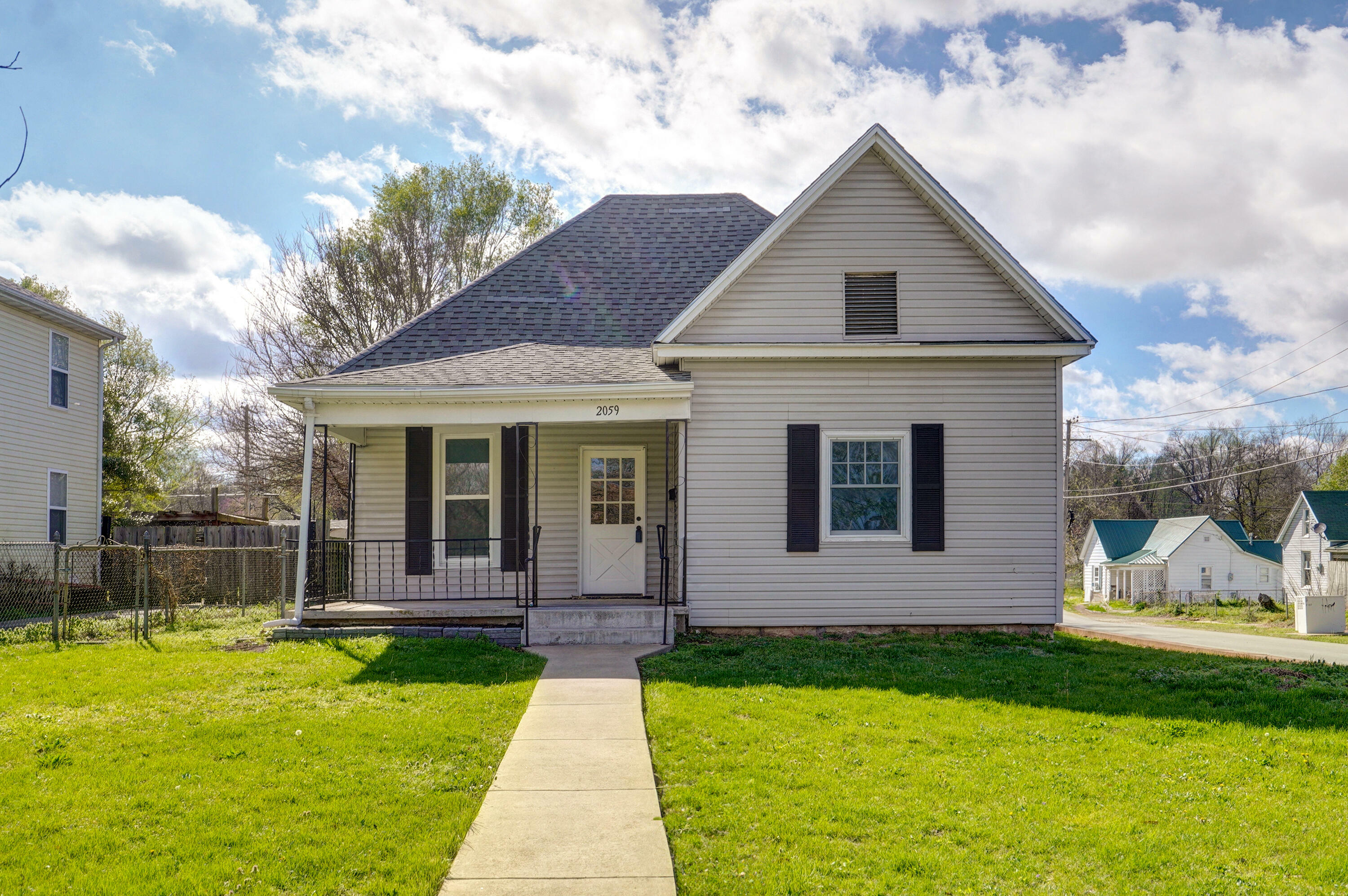 Property Photo:  2059 N Benton Avenue  MO 65803 