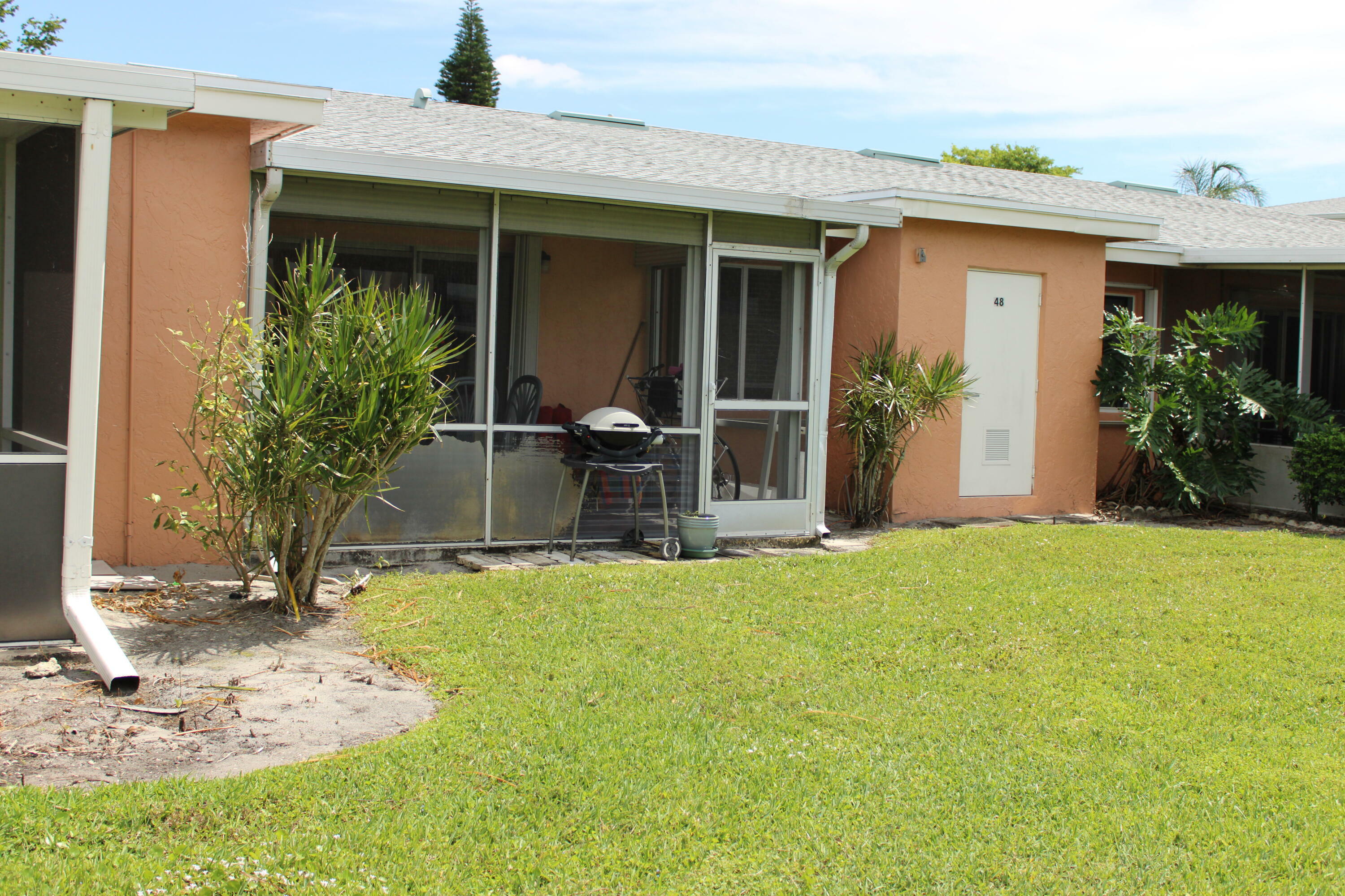 Property Photo:  1700 NW 18th Avenue 48-C  FL 33445 