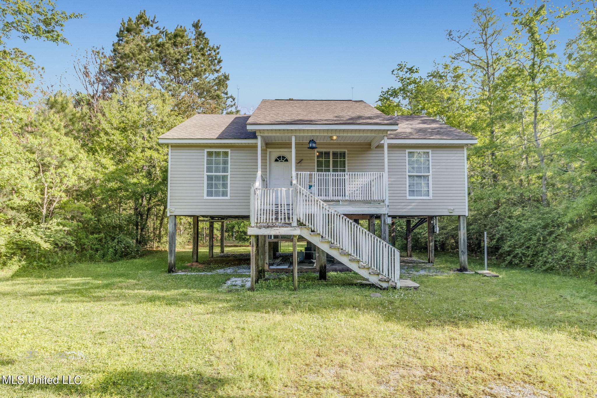 Property Photo:  6038 W Adams Street  MS 39520 