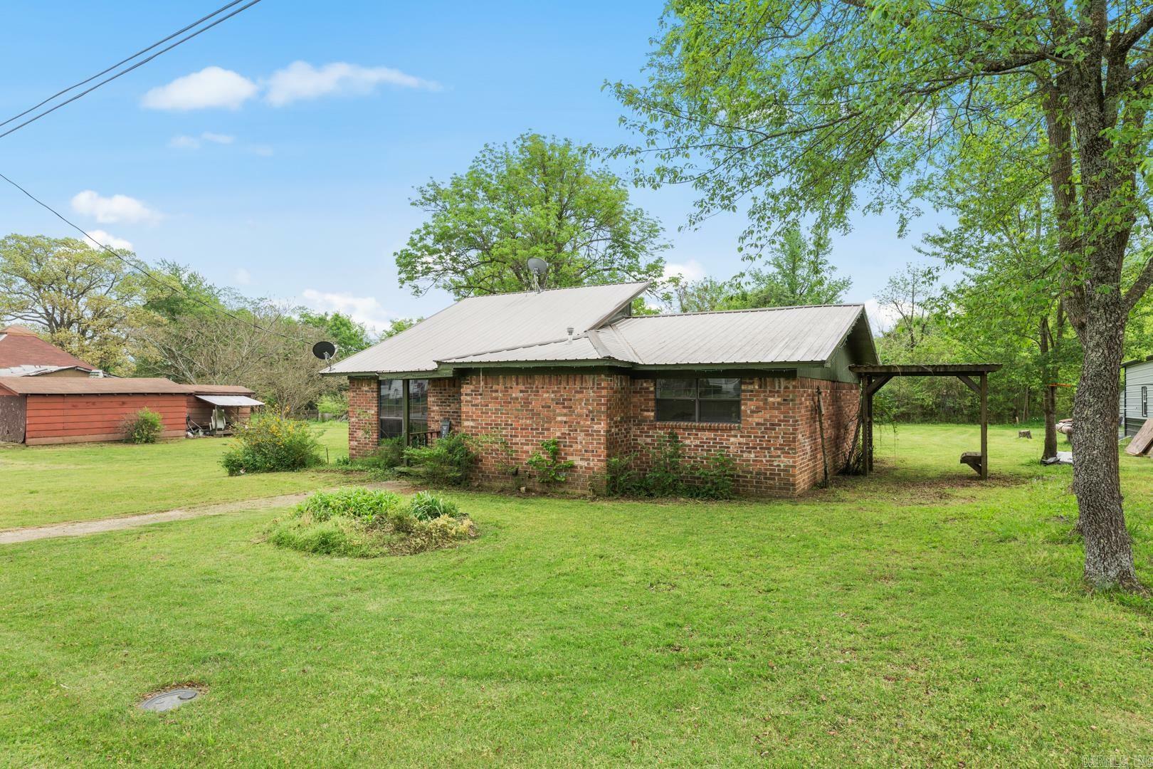 Property Photo:  708 Sampson Avenue  AR 71953 