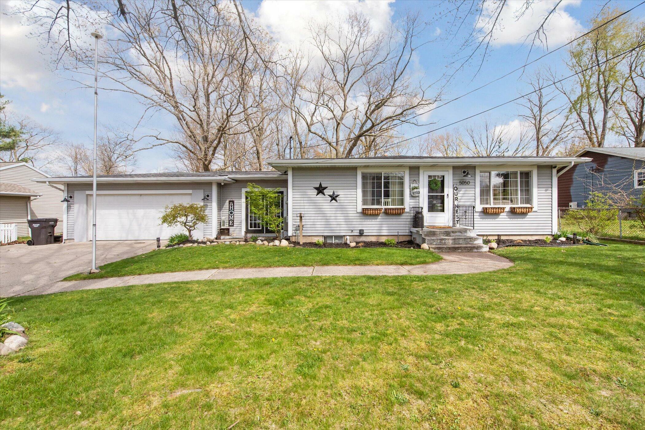 Property Photo:  5050 Burlingame Avenue SW  MI 49509 