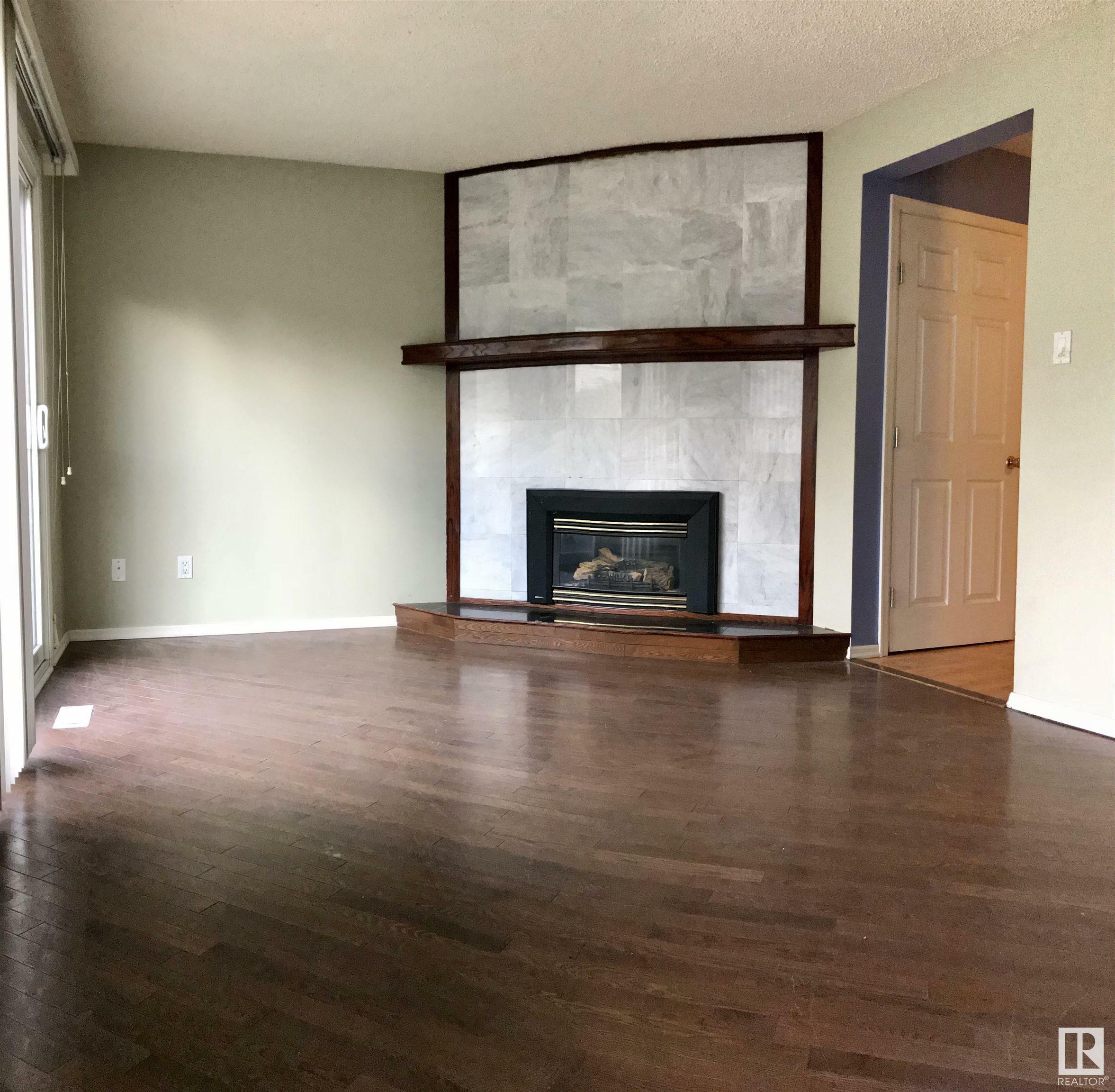 Property Photo:  1199 Hooke Road NW  AB T5A 4A5 
