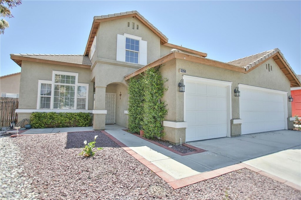 Property Photo: 13269 Via Del Lago CA 92392