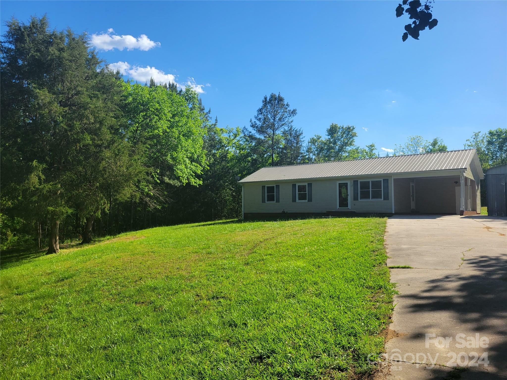 Property Photo:  830 Long Branch Road  NC 28073 