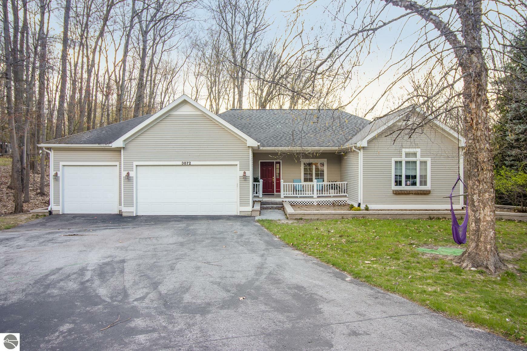 Property Photo:  3872 Village Circle Drive  MI 49686-6305 