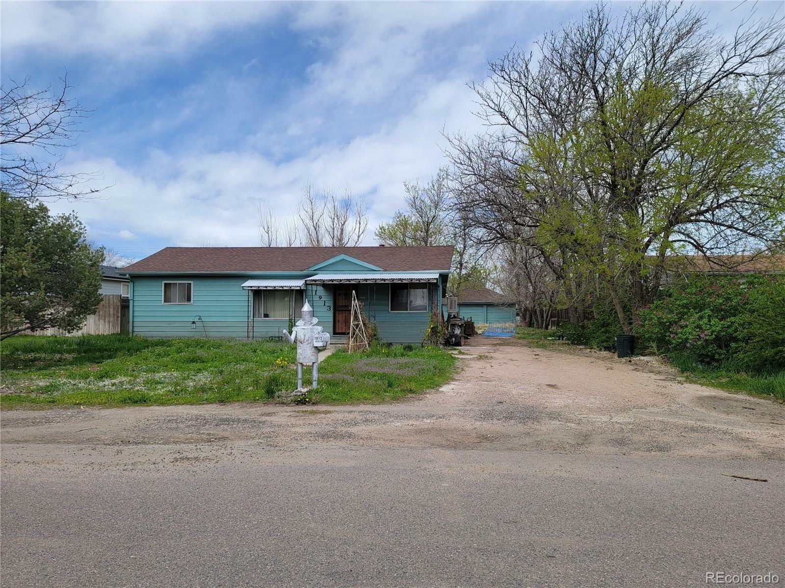 Property Photo:  1913 Burton Street  CO 80136 