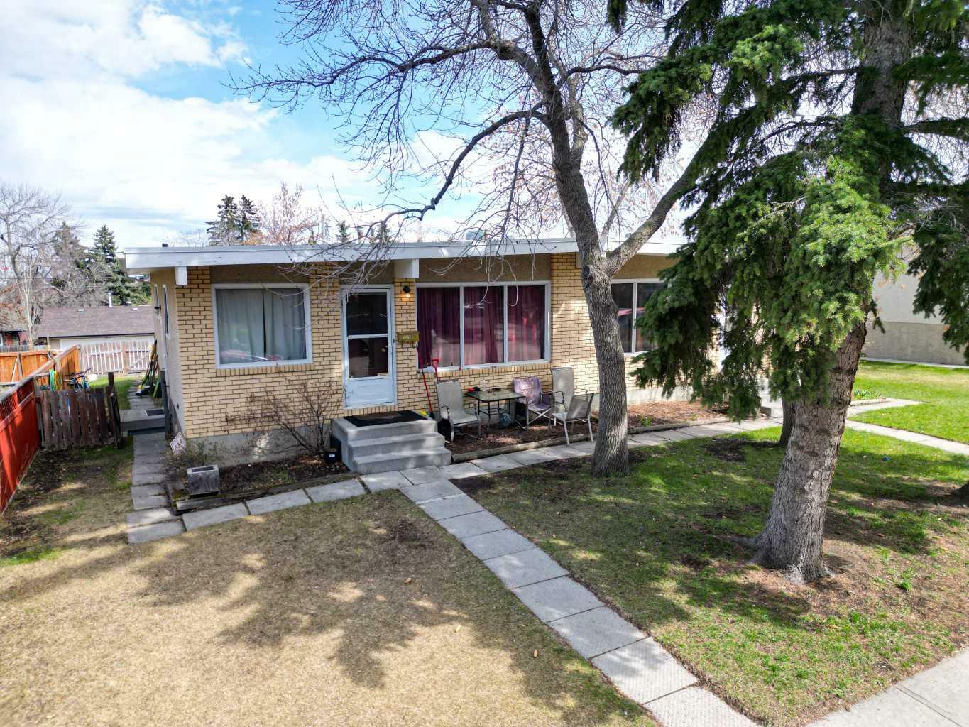 Property Photo:  7114 - 7116 Hunterville Road NW  AB T2K 4J8 