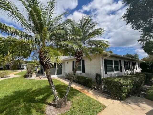 Property Photo:  10140 S 44th Drive 372  FL 33436 