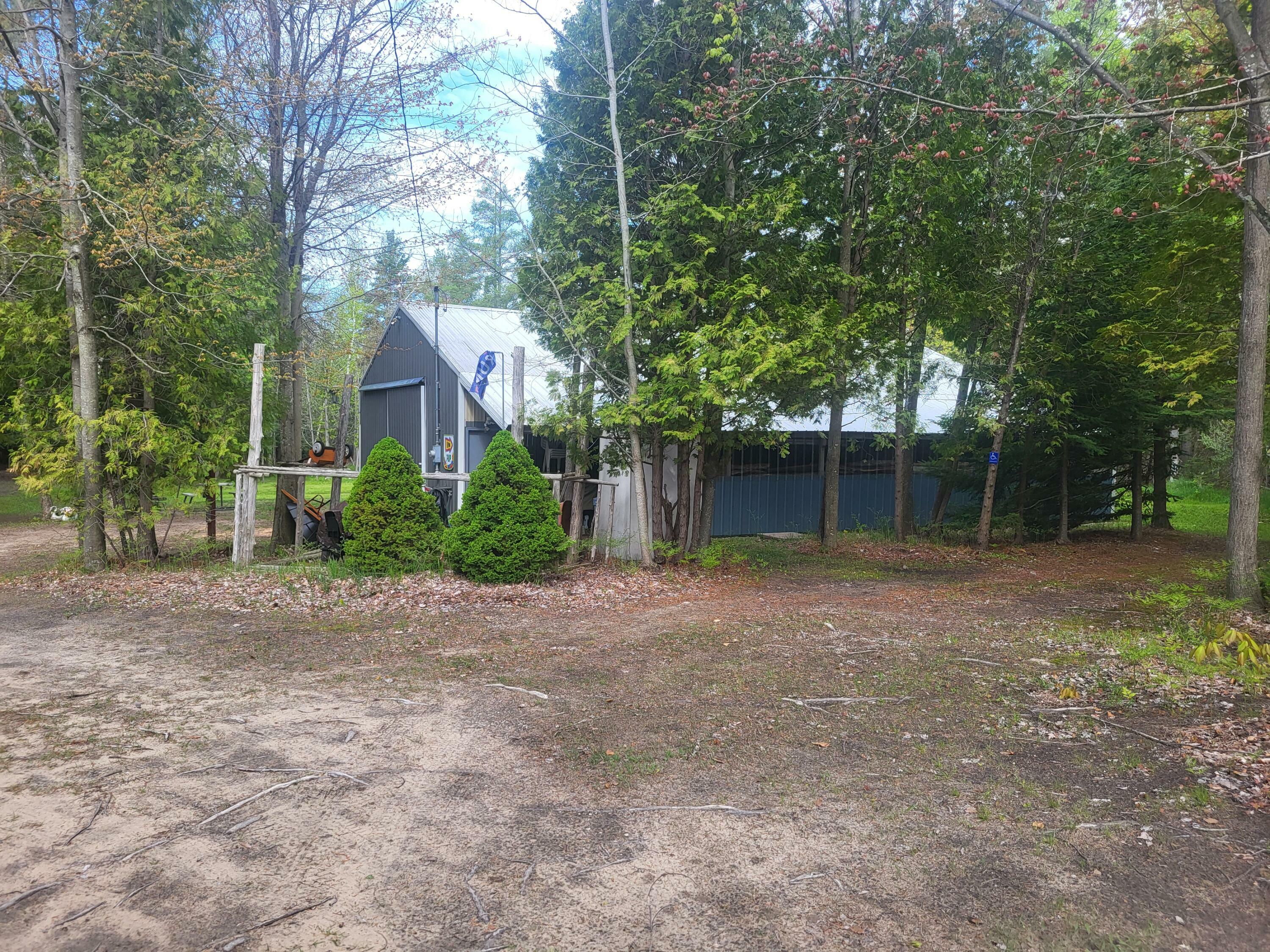 Property Photo:  5450 Swamp Road  MI 49635 